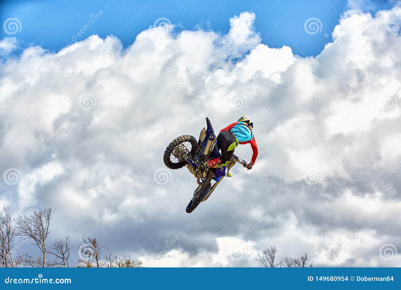 Extreme Sports, Motorcycle Jumping. Motorcyclist Makes an Extreme Jump