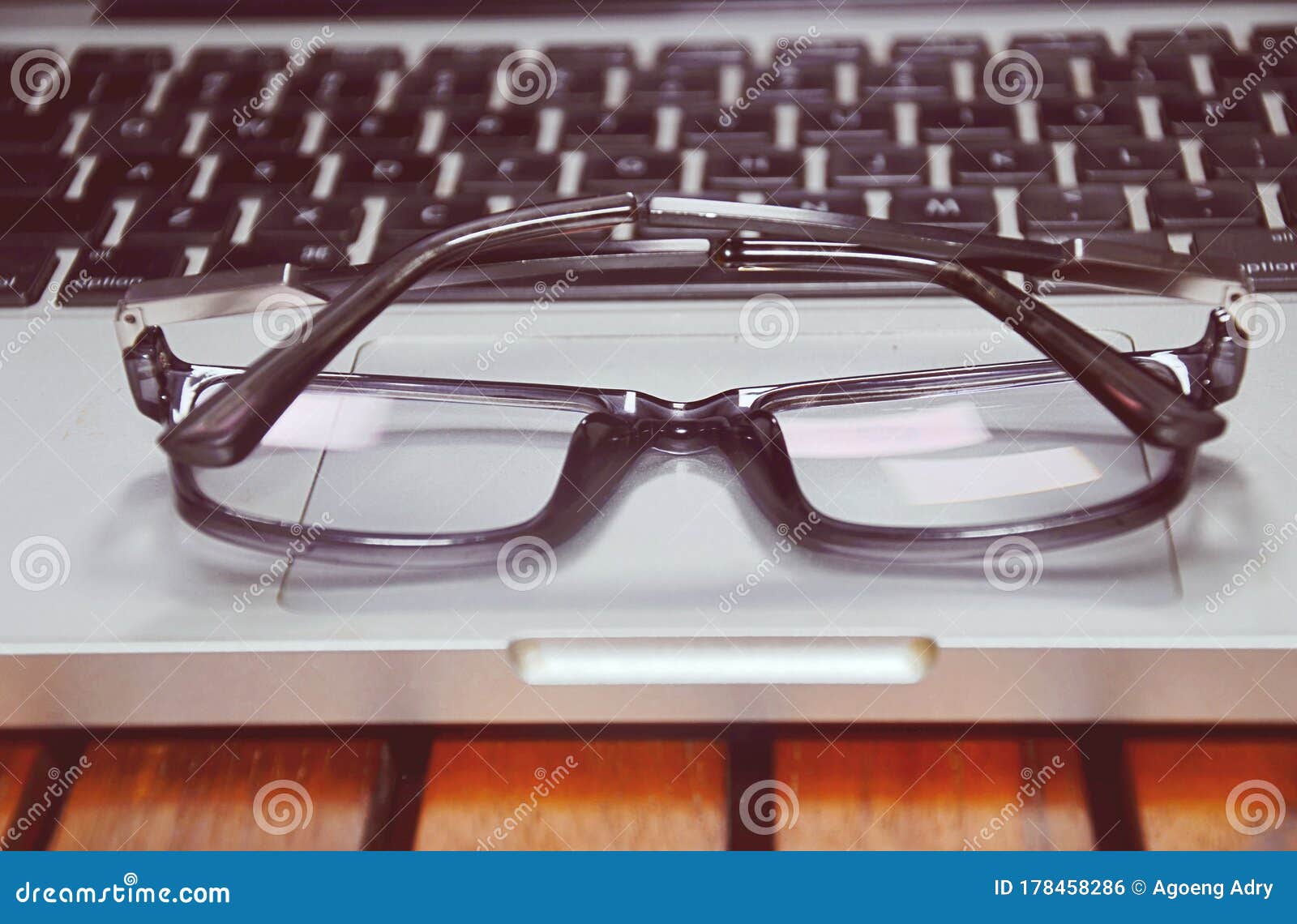 Eye Glasses on Office Computer Keyboard,Close Up Eye Glasses, Office