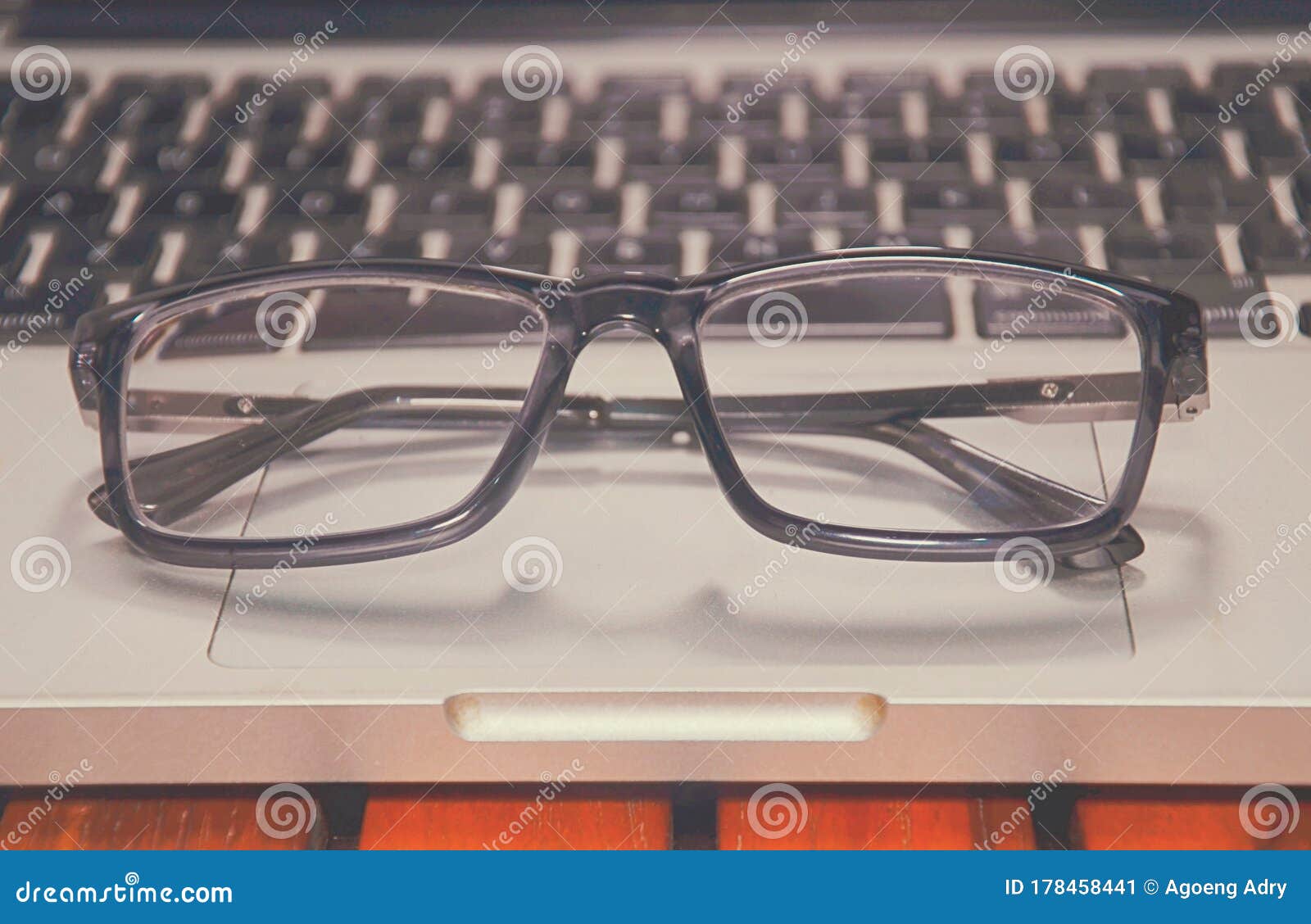 Eye Glasses on Office Laptop Keyboard,Close Up Eye Glasses, Office