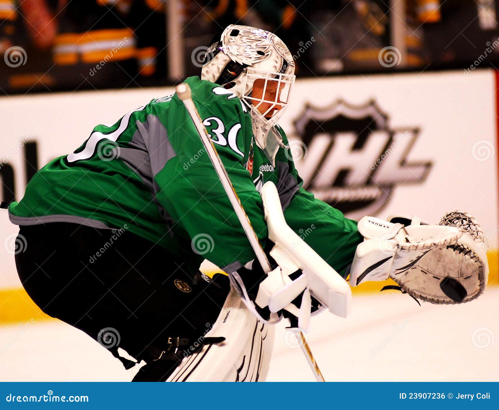 Eye on the Puck. editorial photo. Image of player, puck 23907236