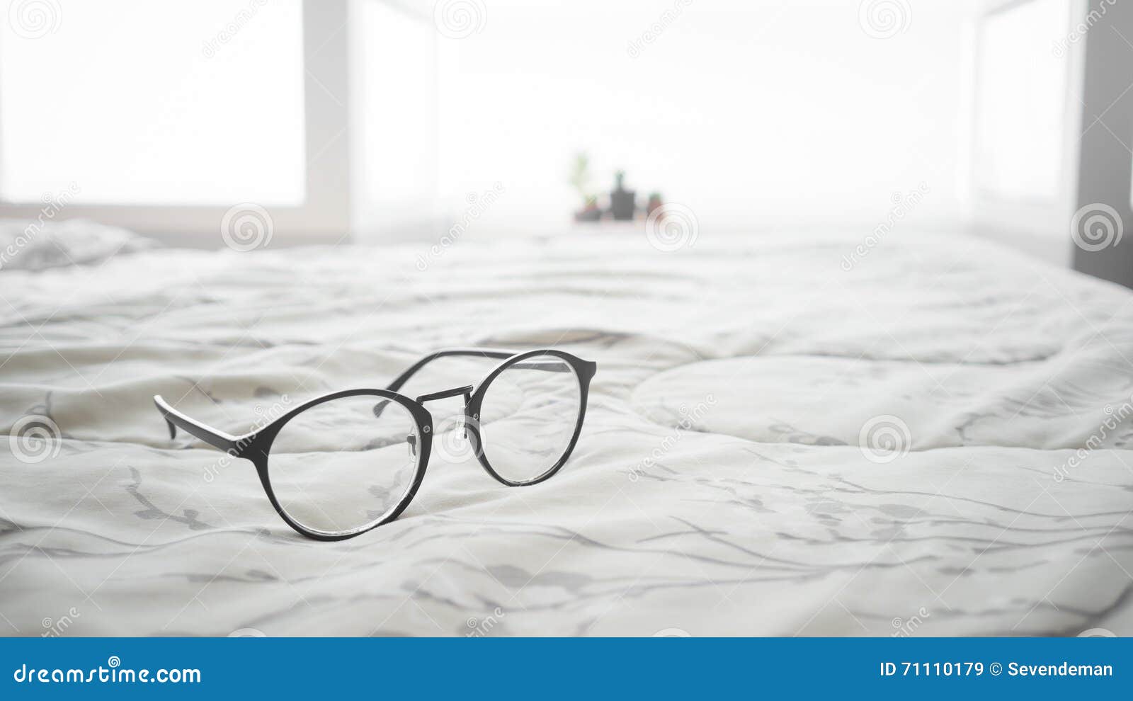 Eyeglasses on the bed. stock image. Image of bedroom 71110179