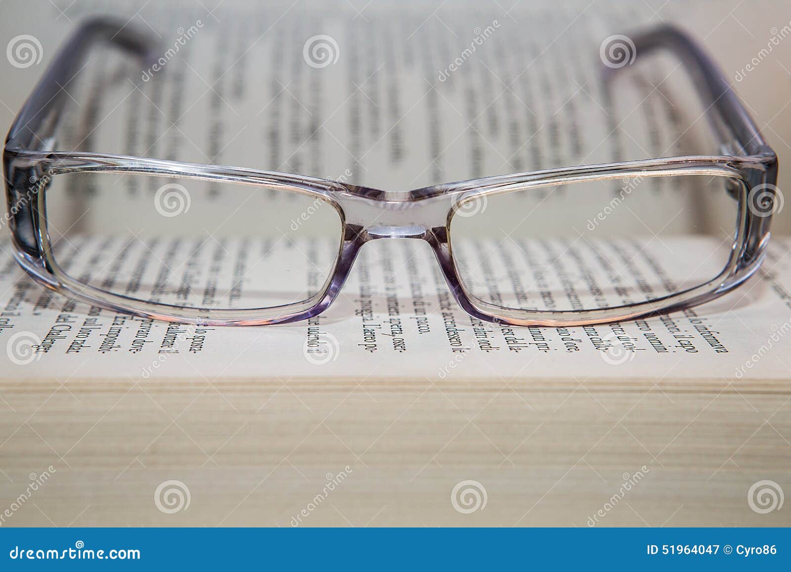 eyeglasses with book
