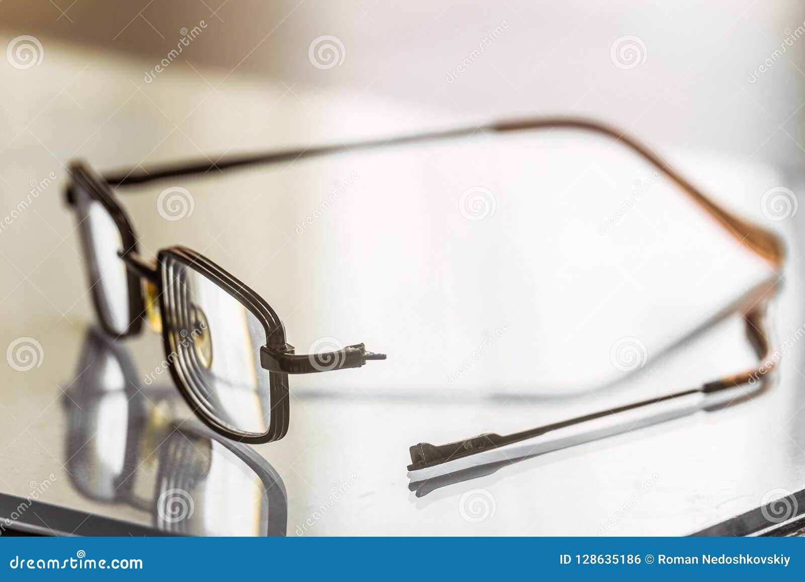 Eyeglasses with a Broken Handle Stock Photo Image of frame, glass
