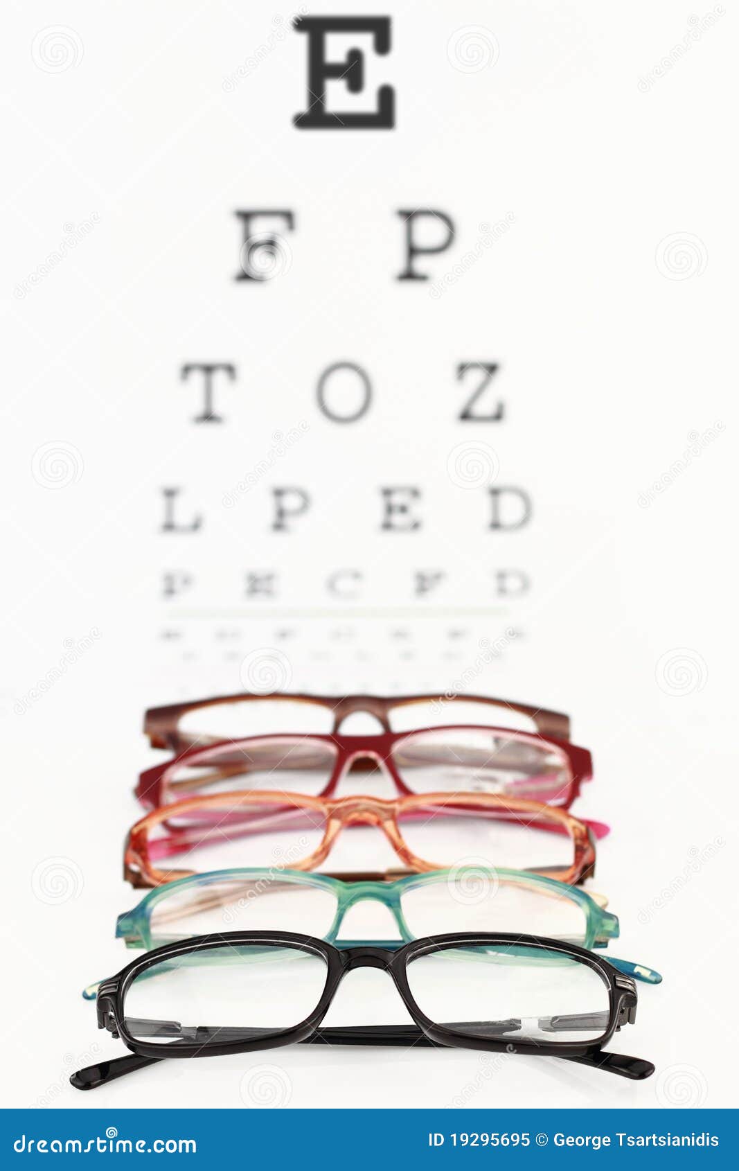 Eyeglasses on an eye chart stock image. Image of optical 19295695