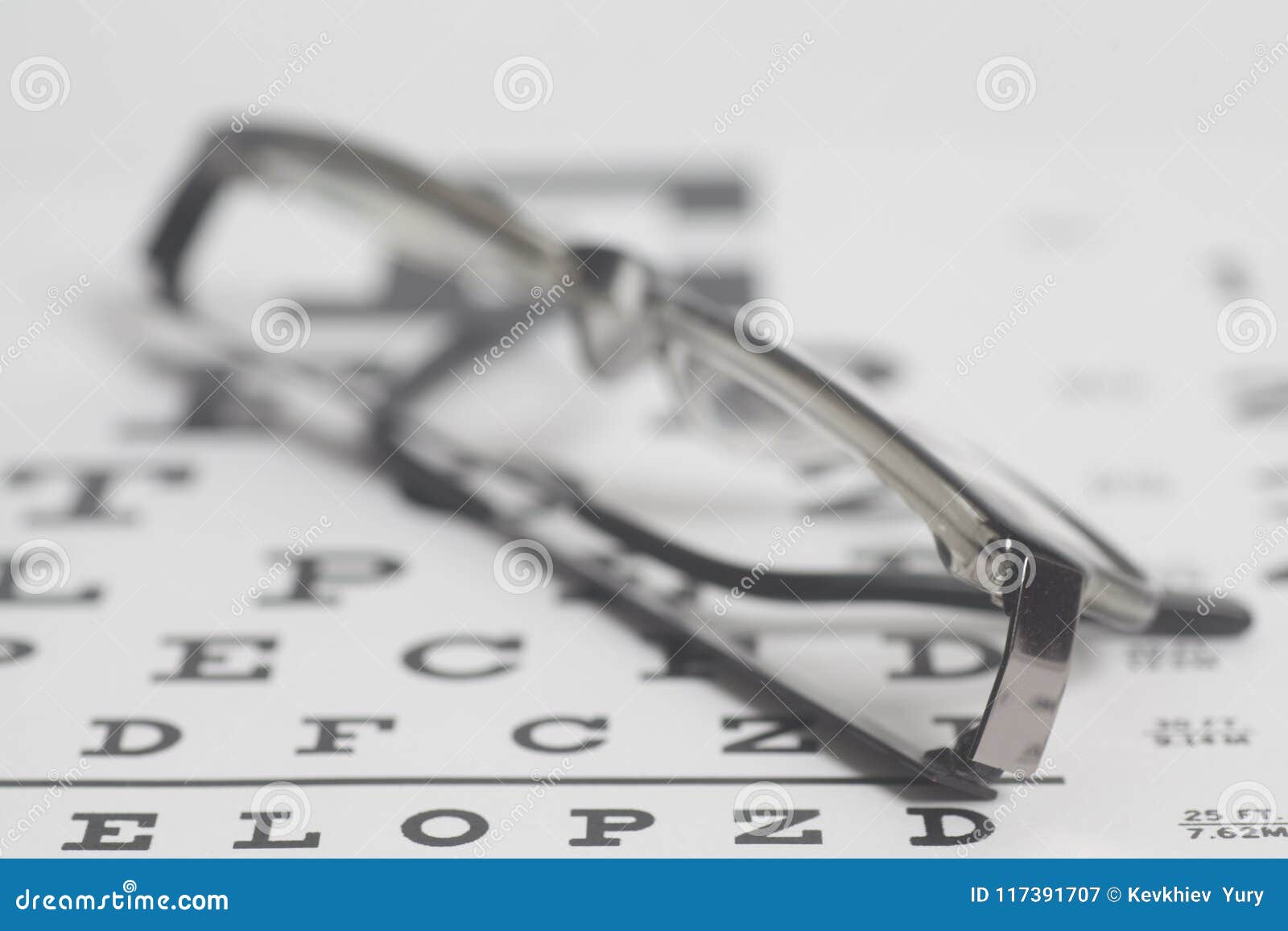 Eyeglasses on Eyesight Test Chart Background. Stock Image Image of