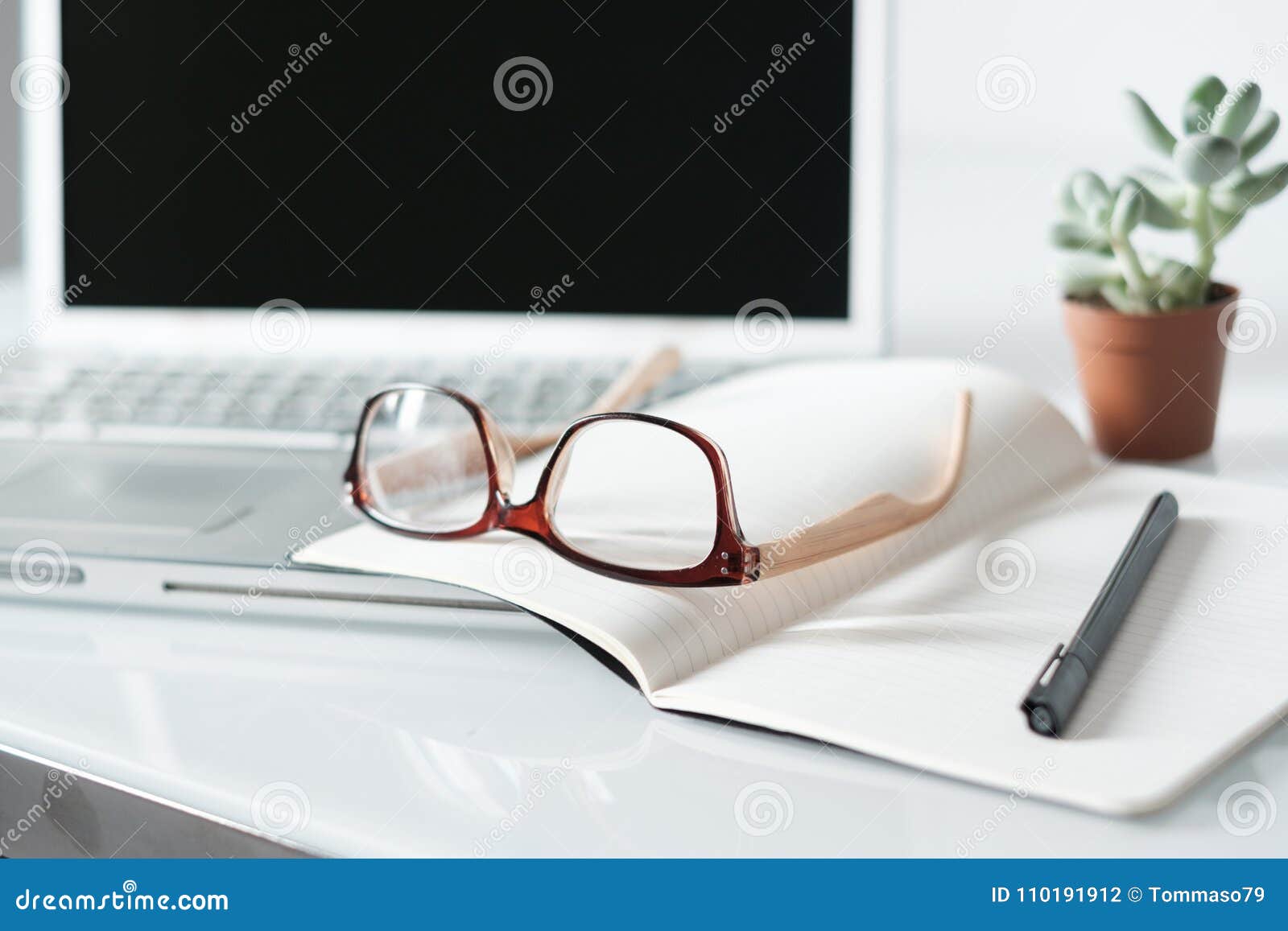 Office Desk with Eyeglasses and Computer Laptop Stock Photo Image of digital, lens 110191912