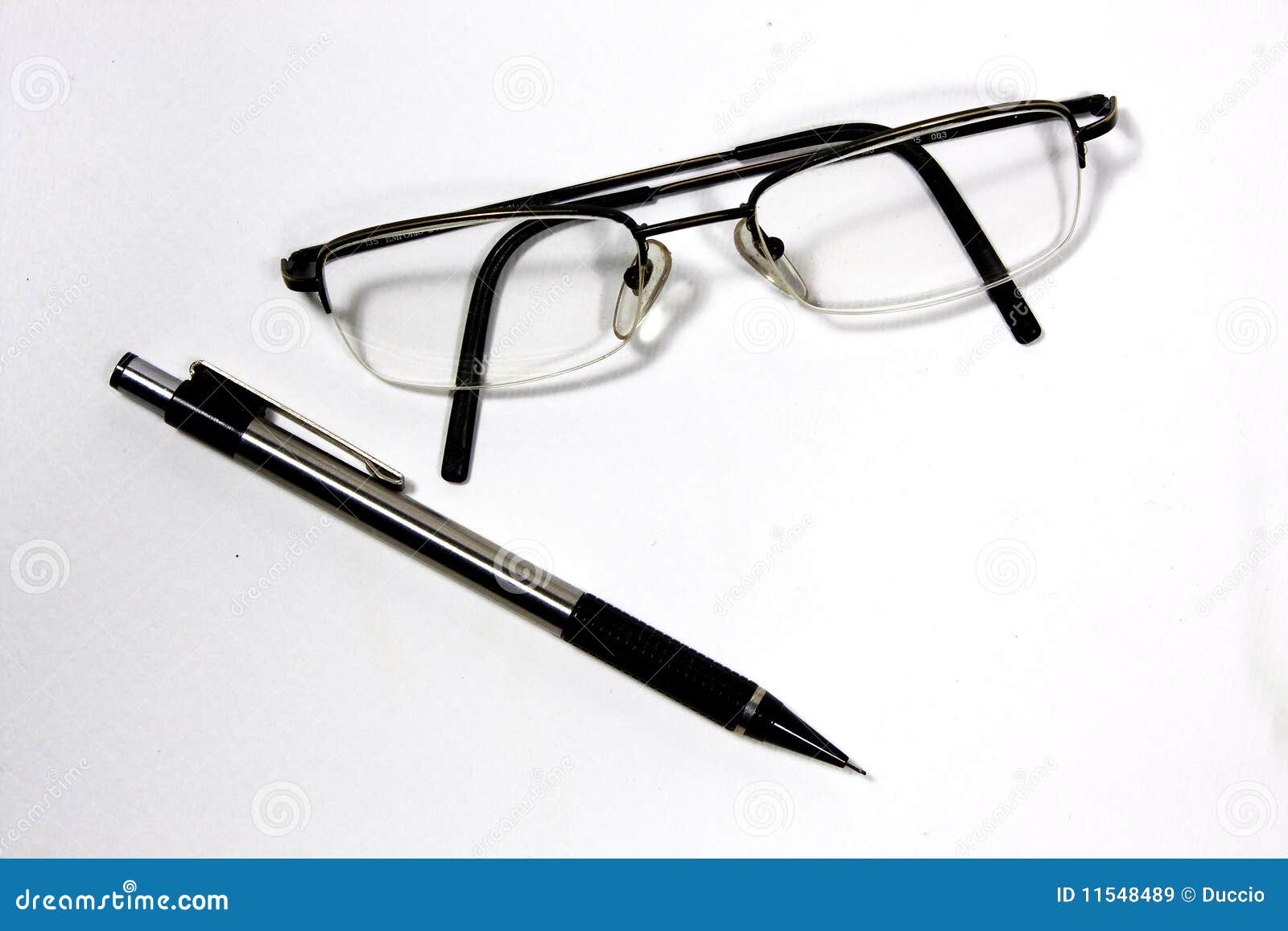 Eyeglasses and pen stock image. Image of fashion, diotrie 11548489