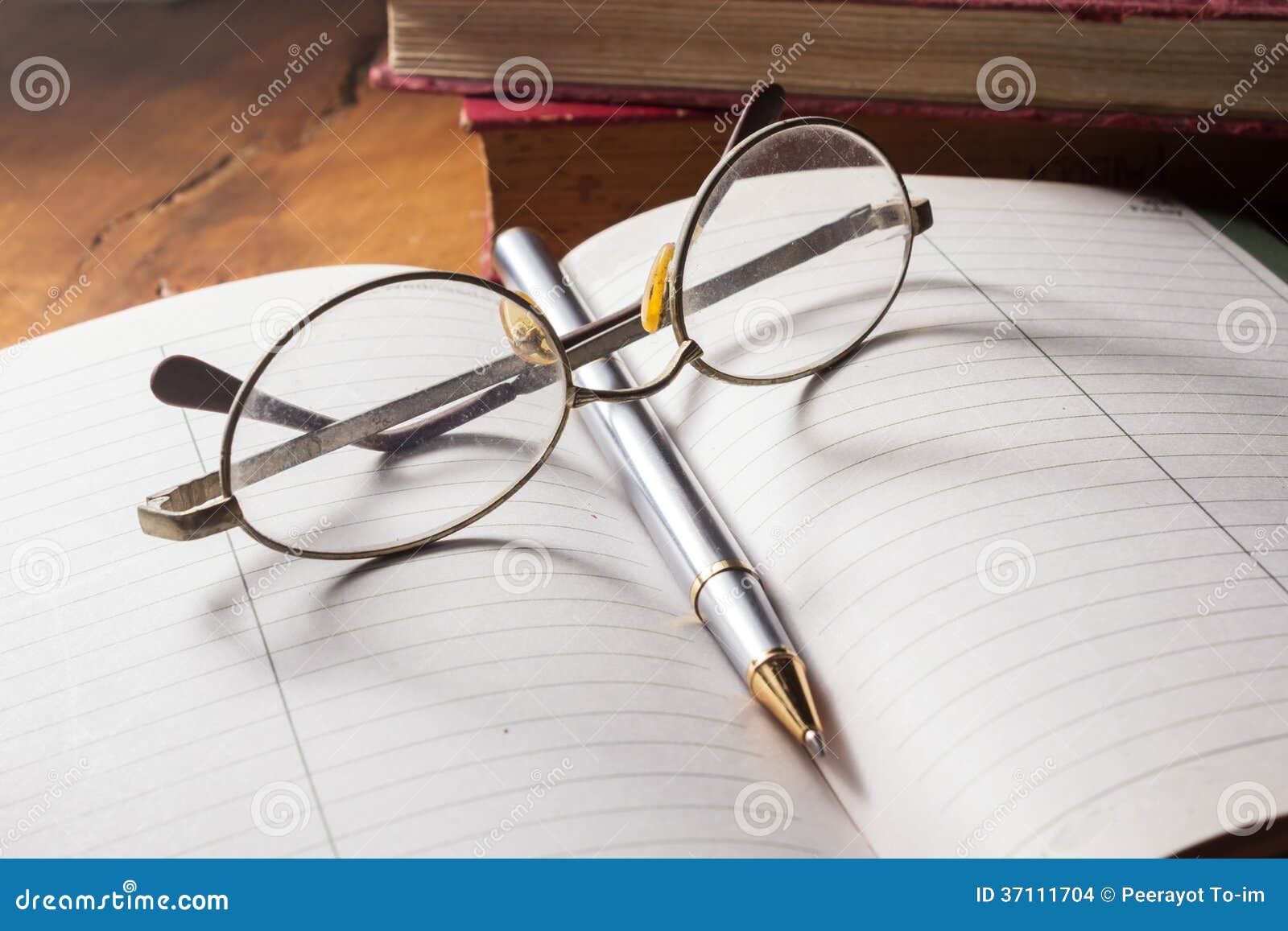 Eyeglasses and Pen on Book. Stock Photo Image of lens, note 37111704