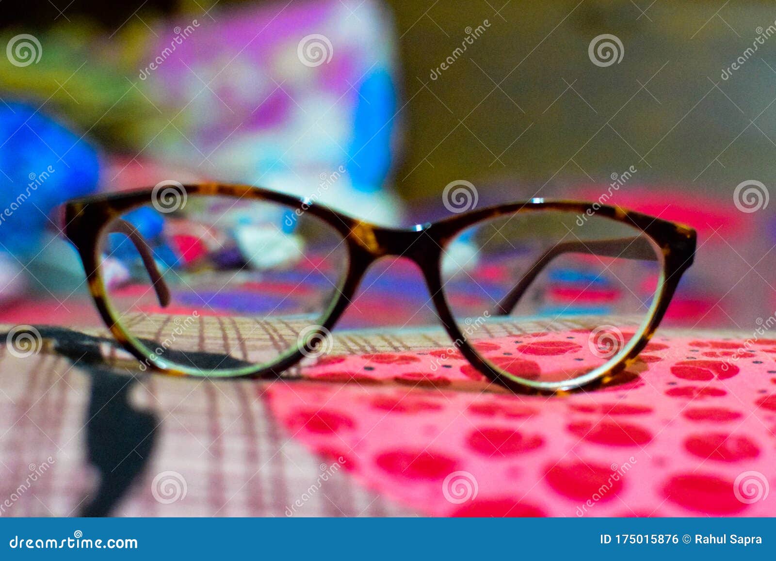 Eyeglasses Placed on the Bed with Amazing Stylish Frame Design Stock
