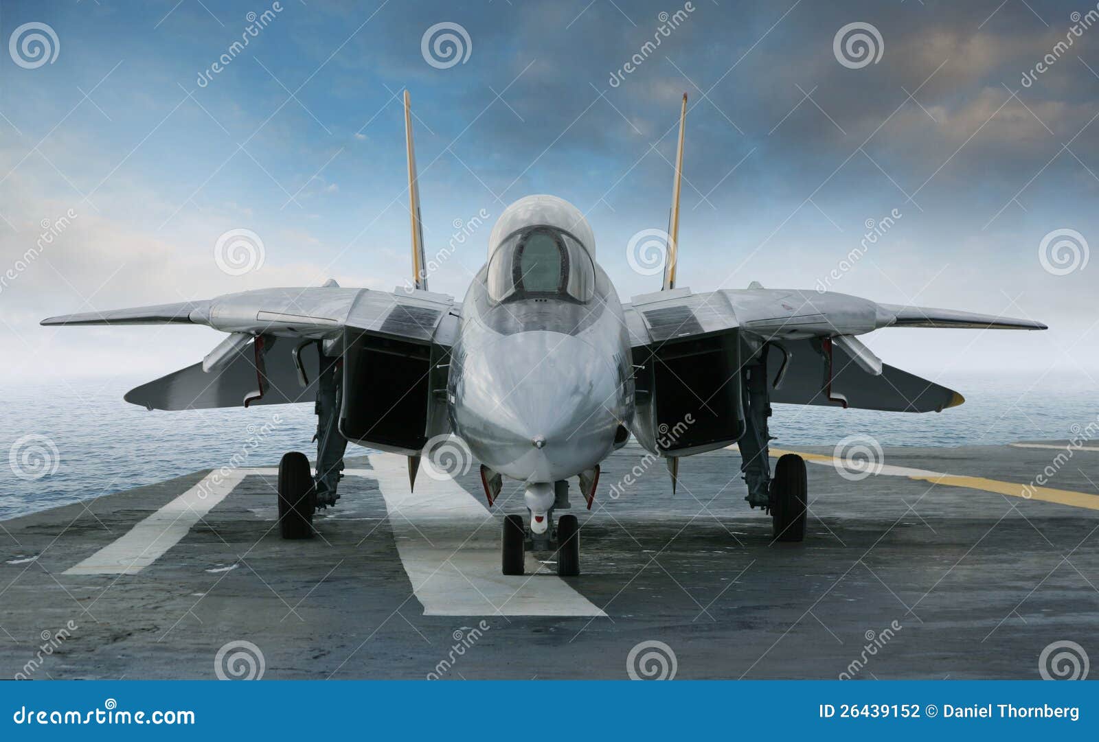 f 14 tomcat jet fighter on a carrier deck
