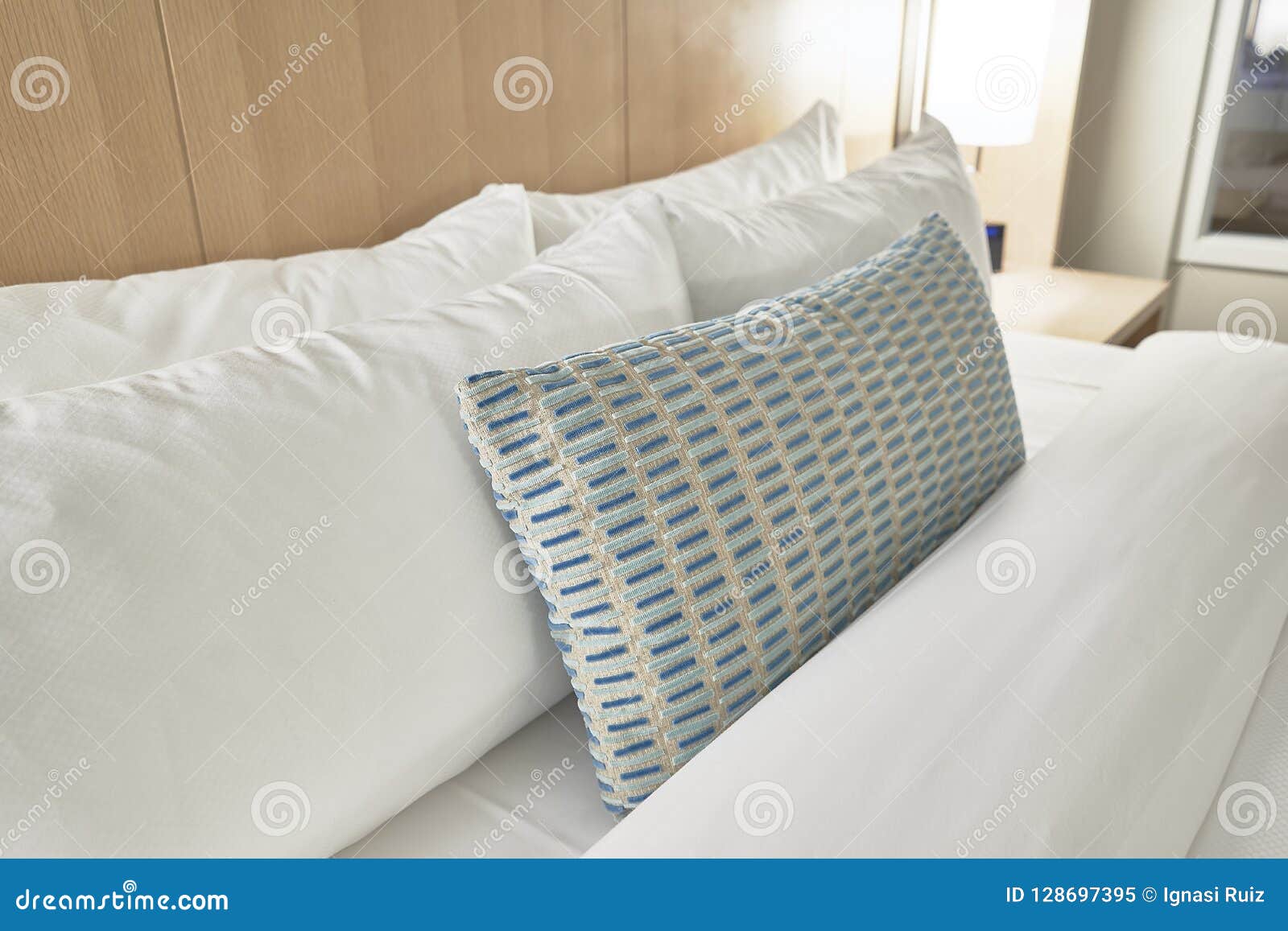 Fabric pillows in a bed stock image. Image of lifestyle 128697395