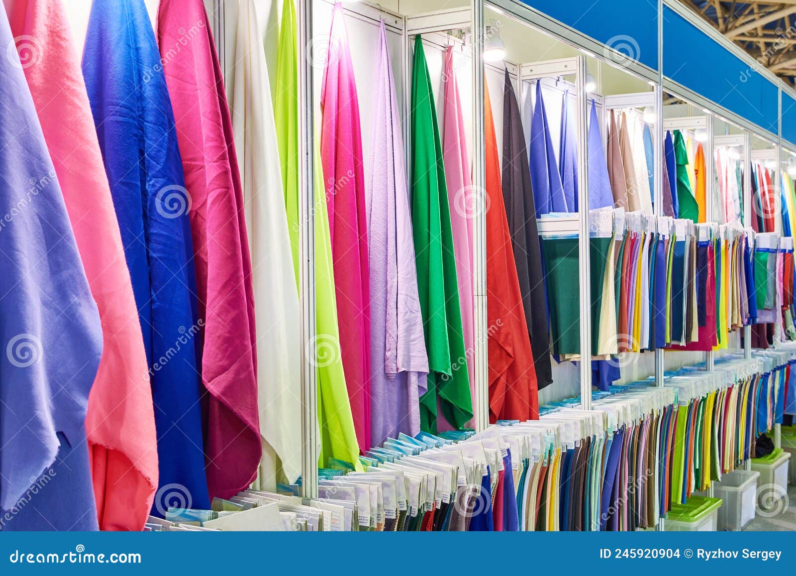 Fabric for sewing clothes stock photo. Image of orange 245920904