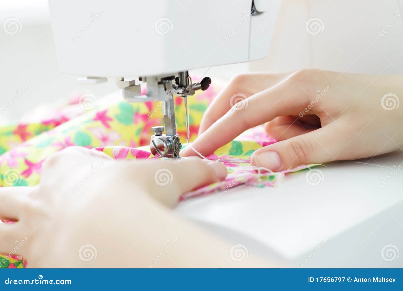 Fabric in a sewing machine stock image. Image of cloth 17656797