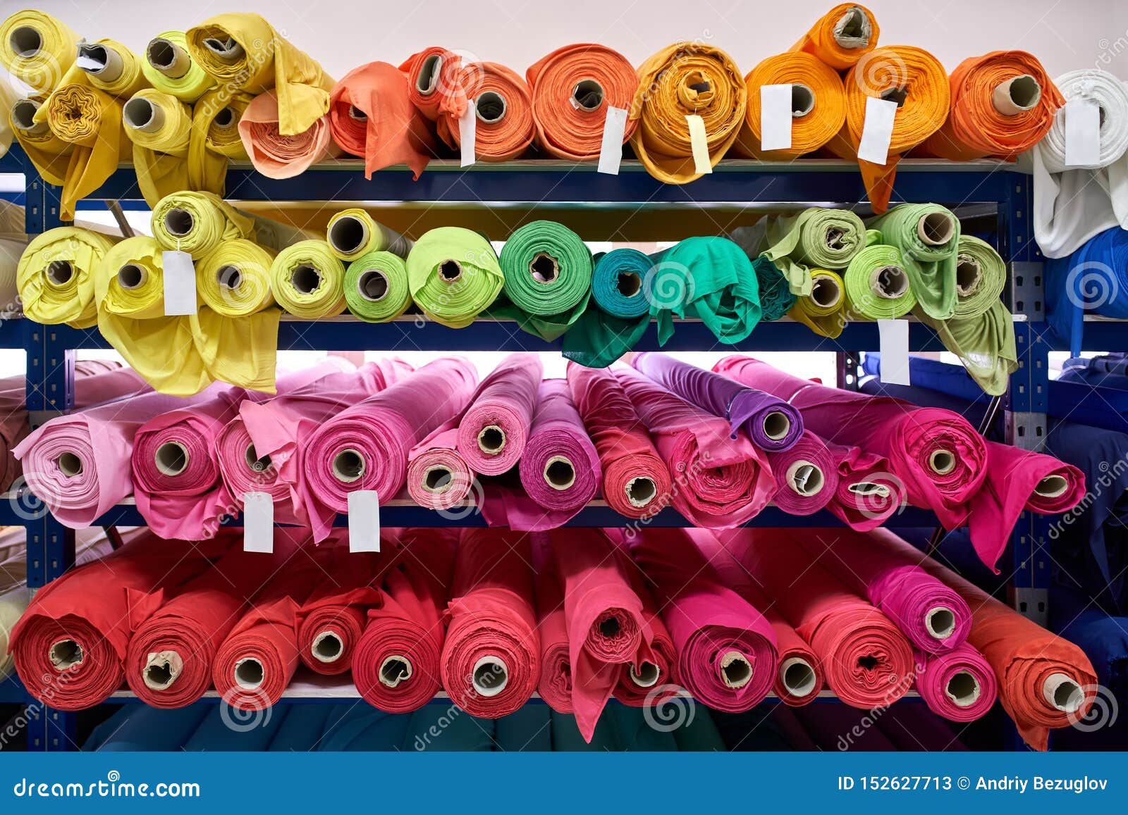 Fabric Warehouse with Many Multicolored Textile Rolls Stock Image