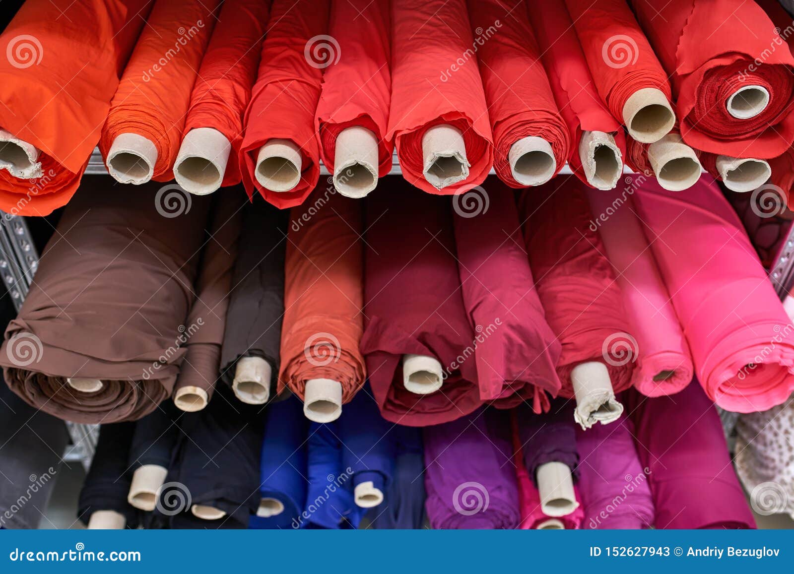 Fabric Warehouse with Many Multicolored Textile Rolls Stock Image