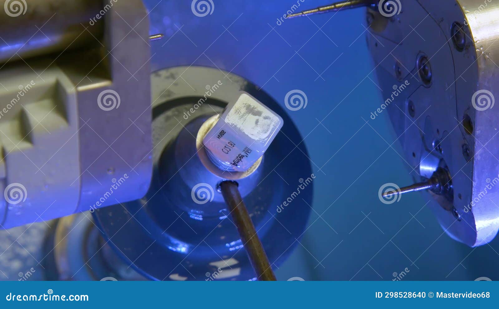 The Milling Machine Cuts the Ceramic Dental Crown from the Workpiece