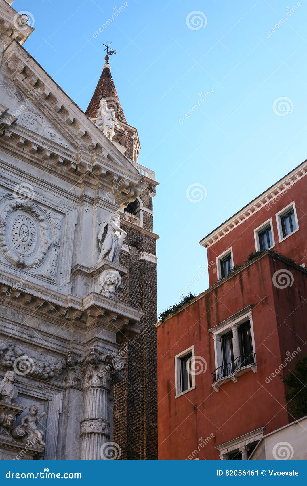 facade of church and house in venice