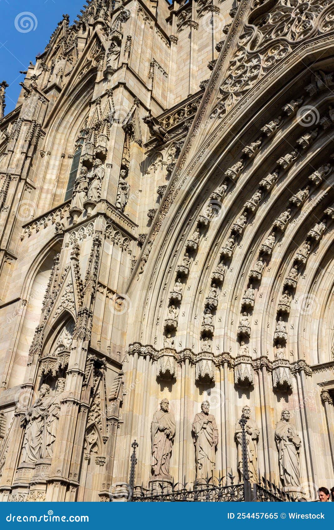 facade of the gothic cathedral in ciutat vella barcelona, spain