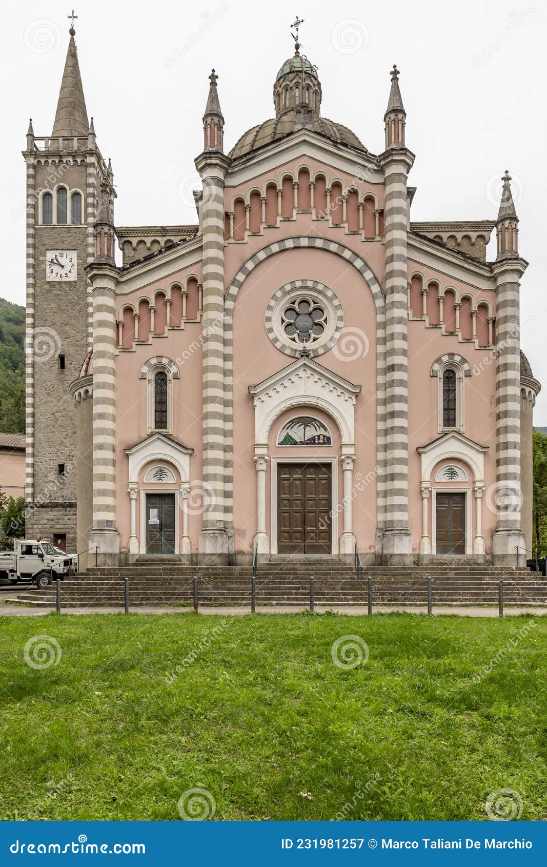 facade of the parish church of san mamante, lizzano in belvedere, italy