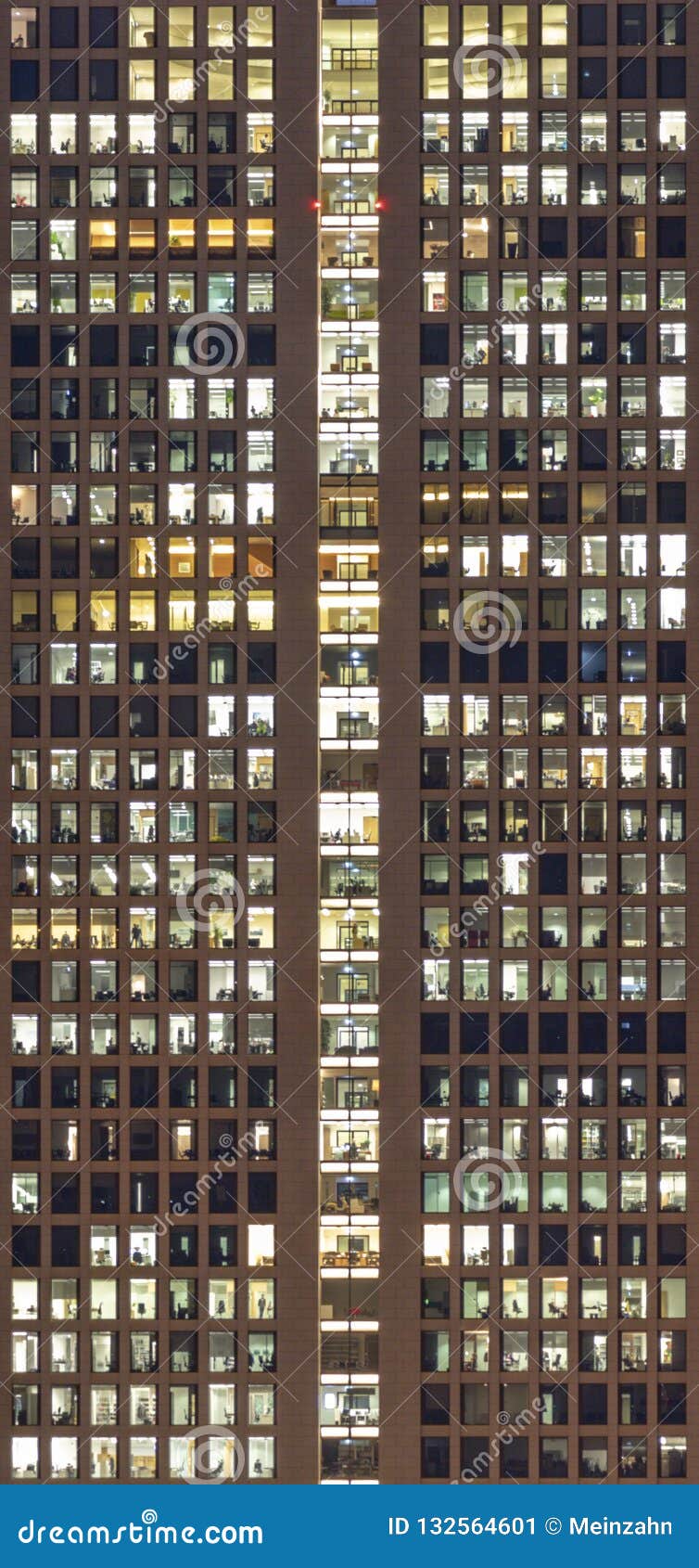 facade of skyscraper in the evening with offices as  for w