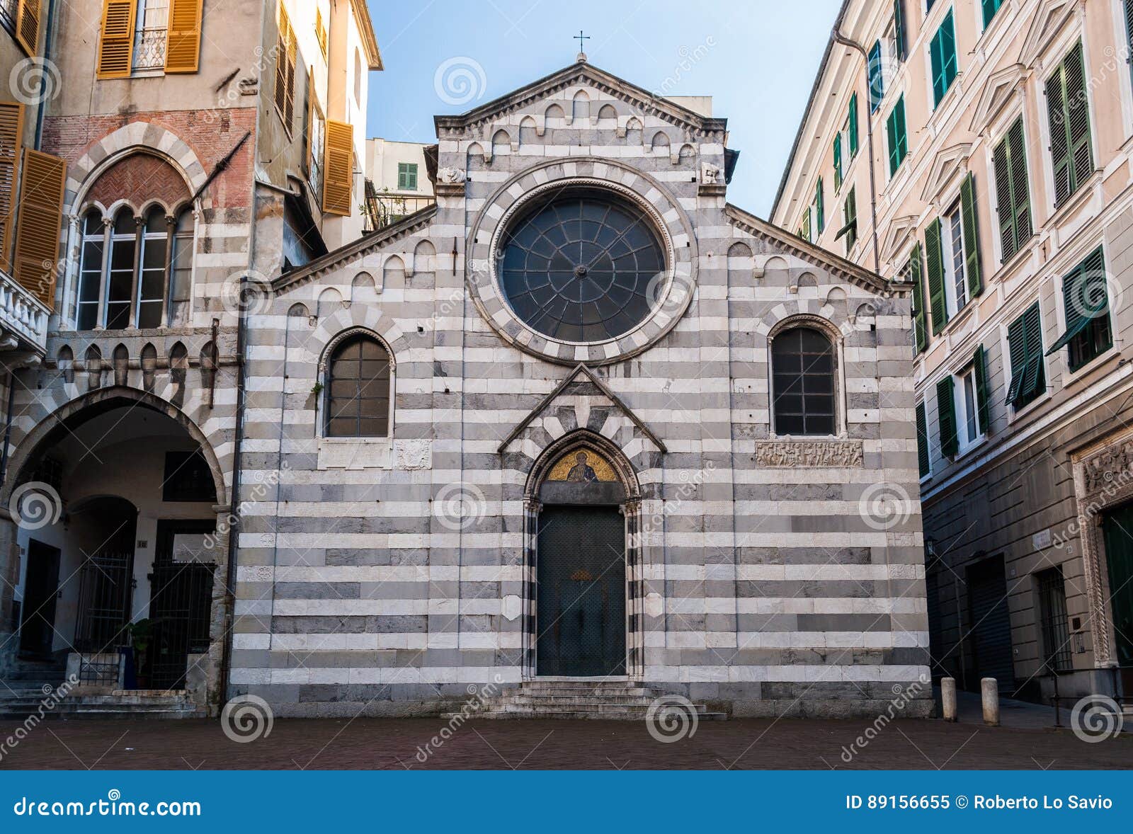 the facade of the small church of `san matteo` xii century, in the downtown of genoa