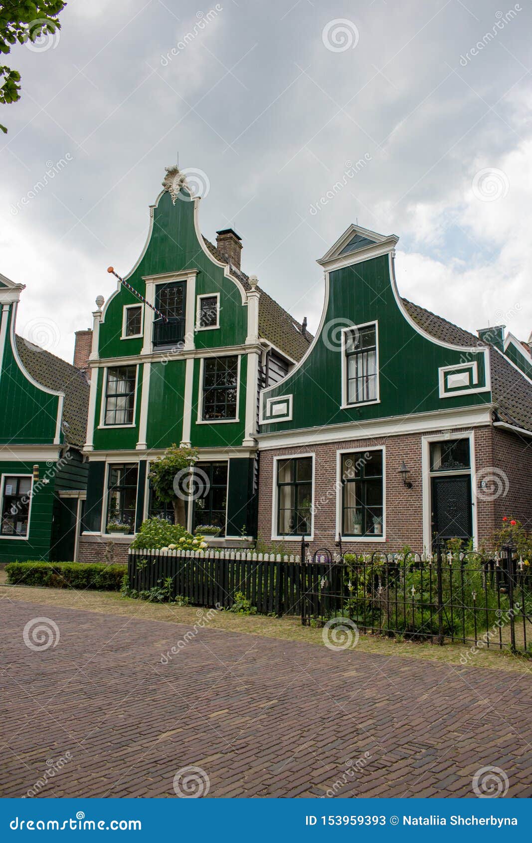 Facade Of Traditional Dutch Buildings In Village Old Brick And Wooden