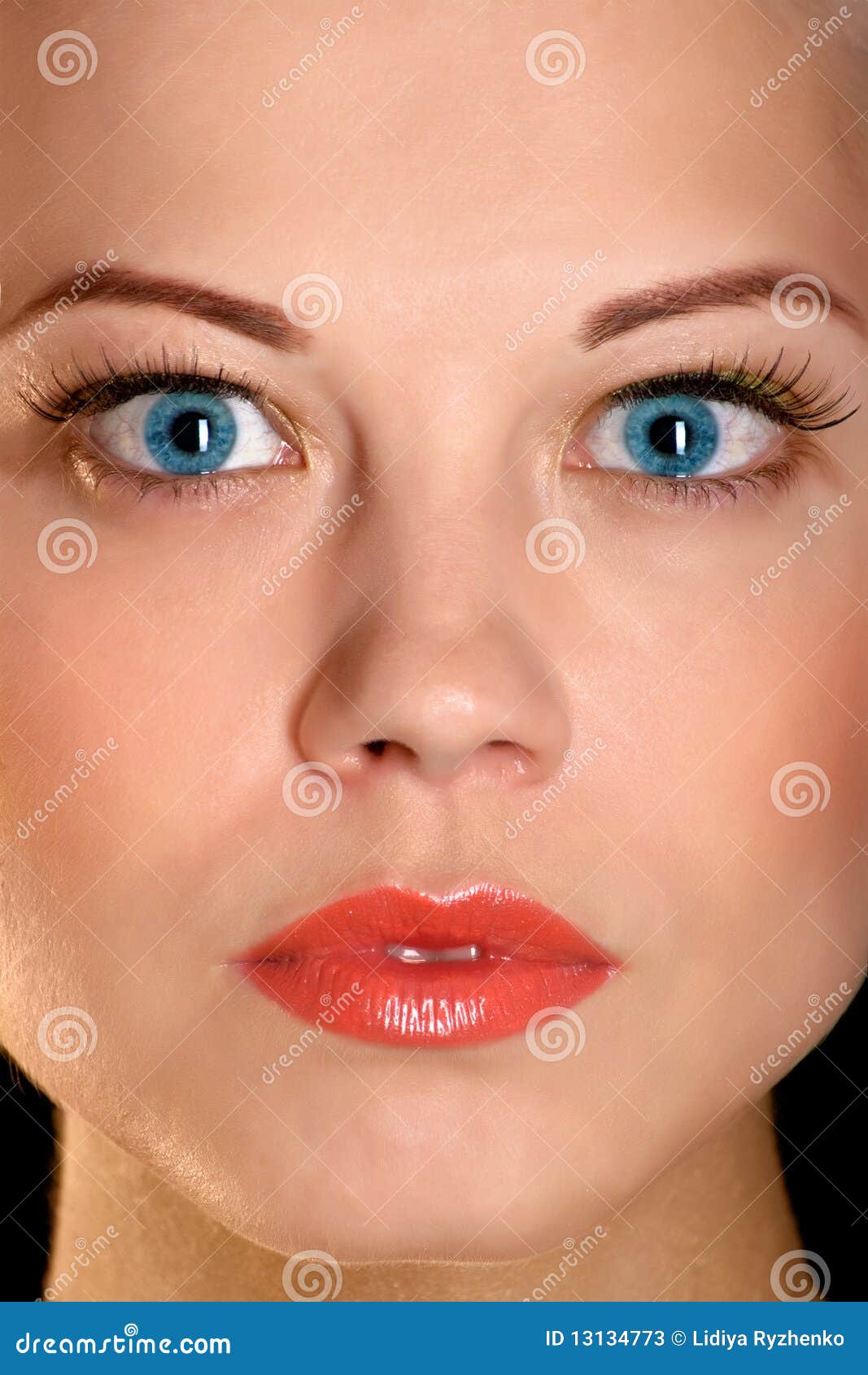 The Face Of The Beautiful Girl With Blue Eyes Stock Image