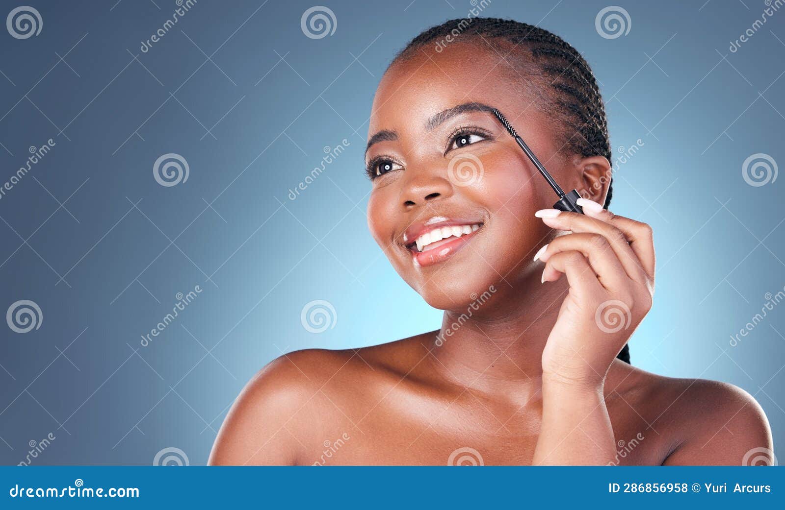 face brush, eyebrow and beauty of a woman with dermatology, natural makeup and smile. happy african person on blue
