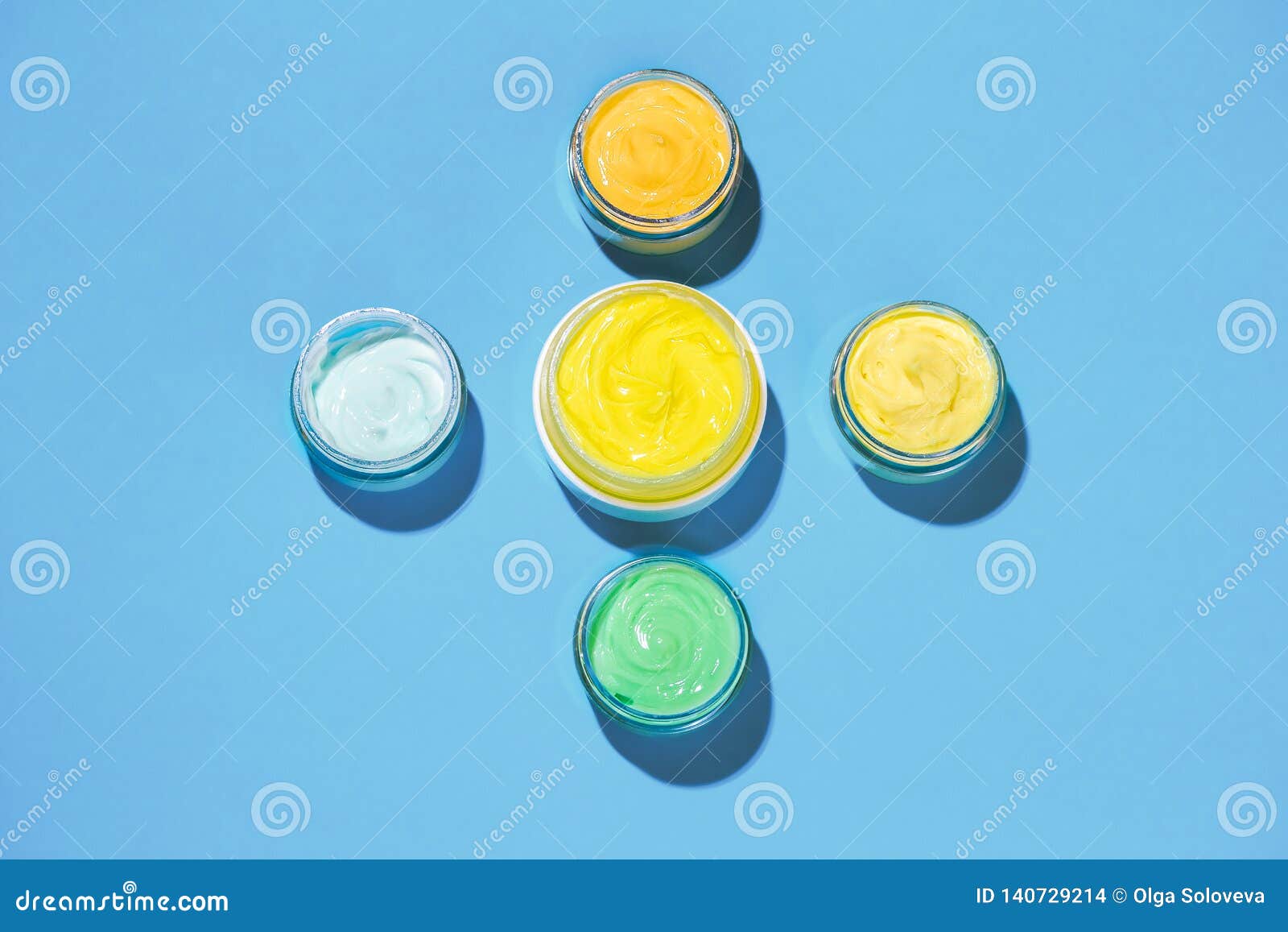 Face Cream on a Bright Blue Background. Cosmetics Concept Stock Photo ...