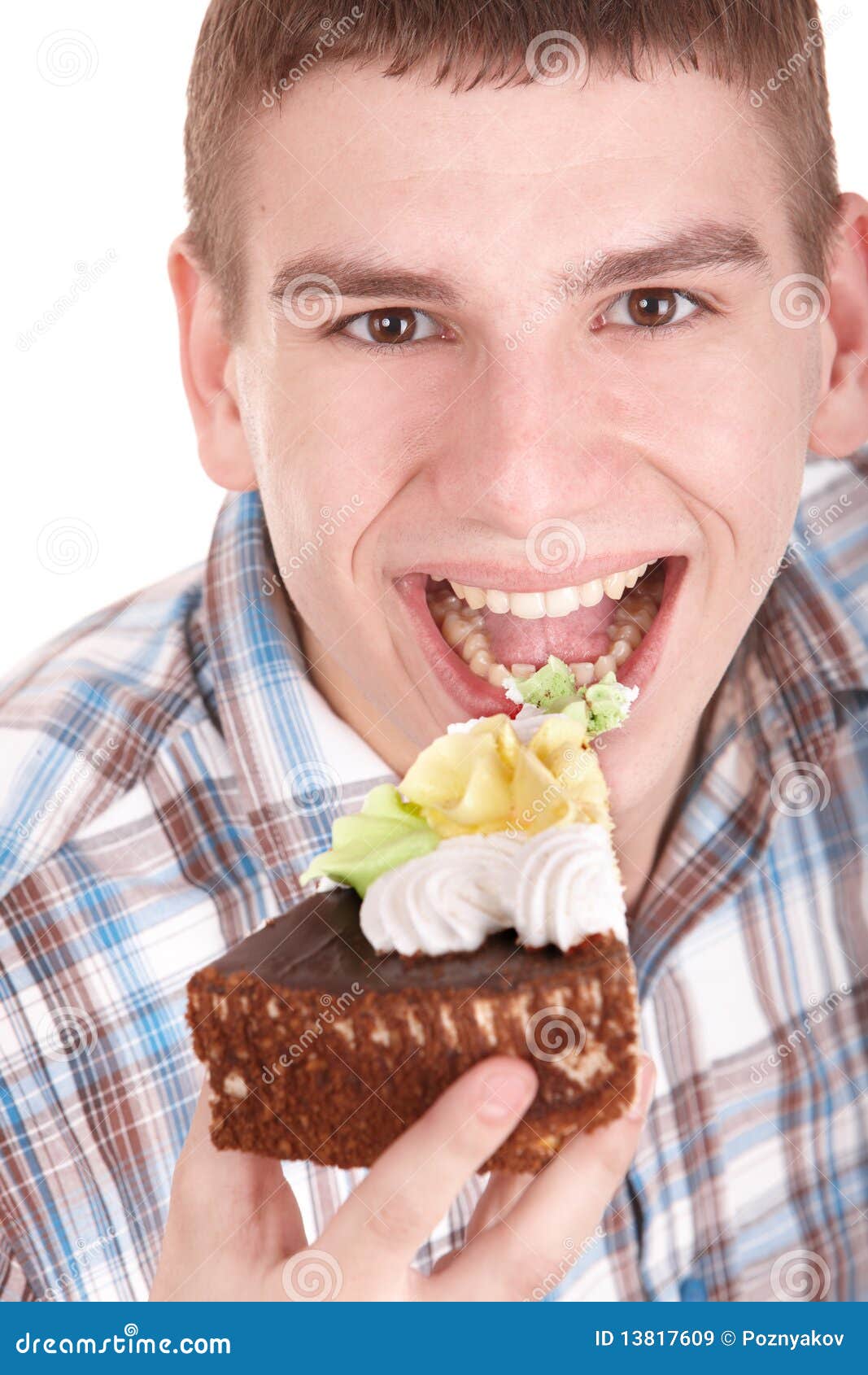 Face of man eating cake. stock image. Image of smile - 13817609