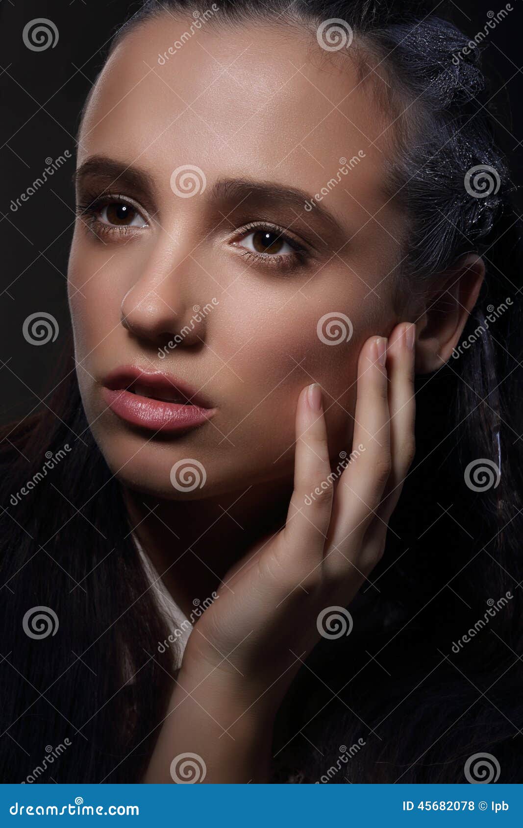 face of meditative pensive woman in dreams