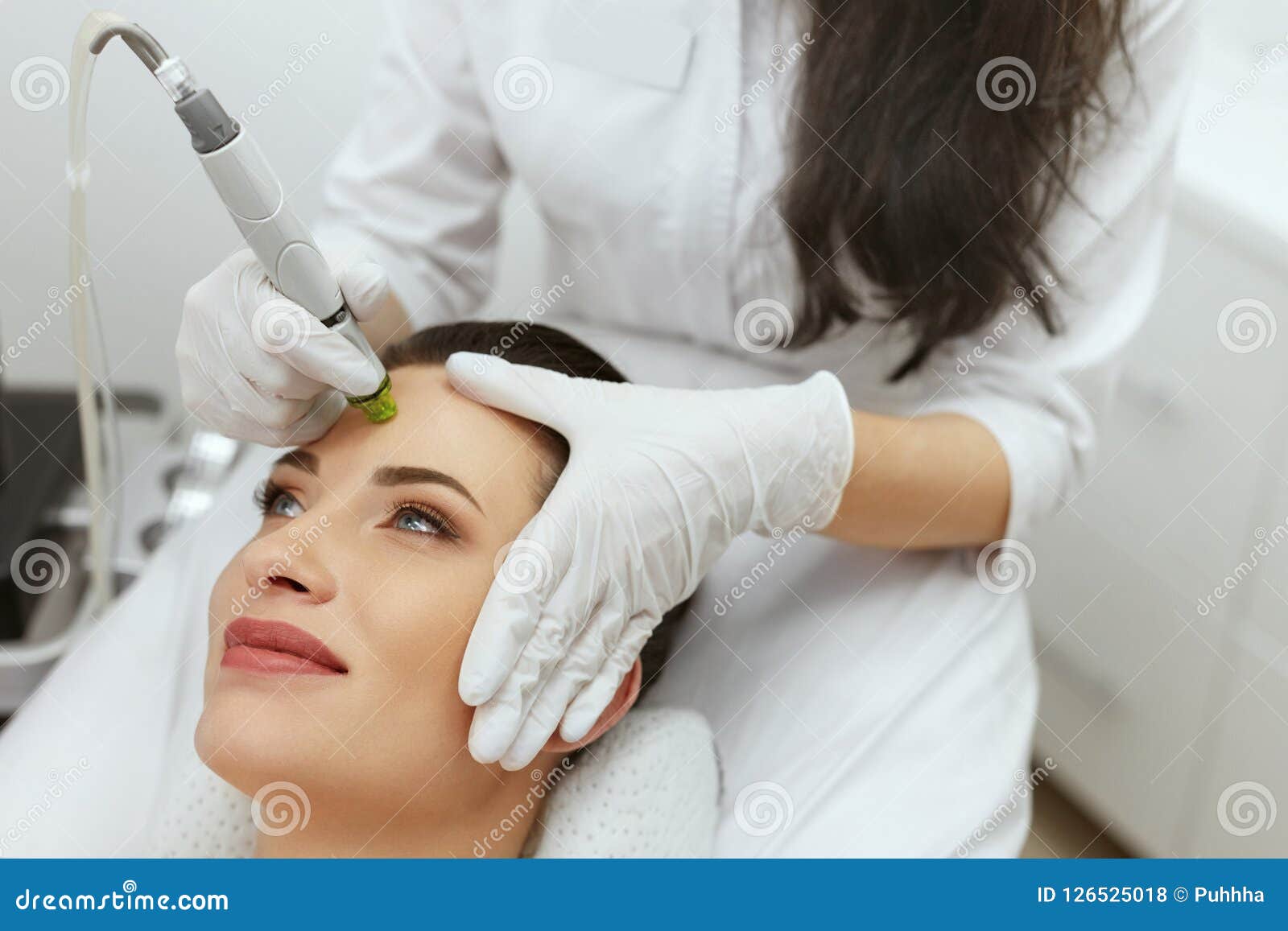 face skin care. woman getting facial hydro exfoliating treatment