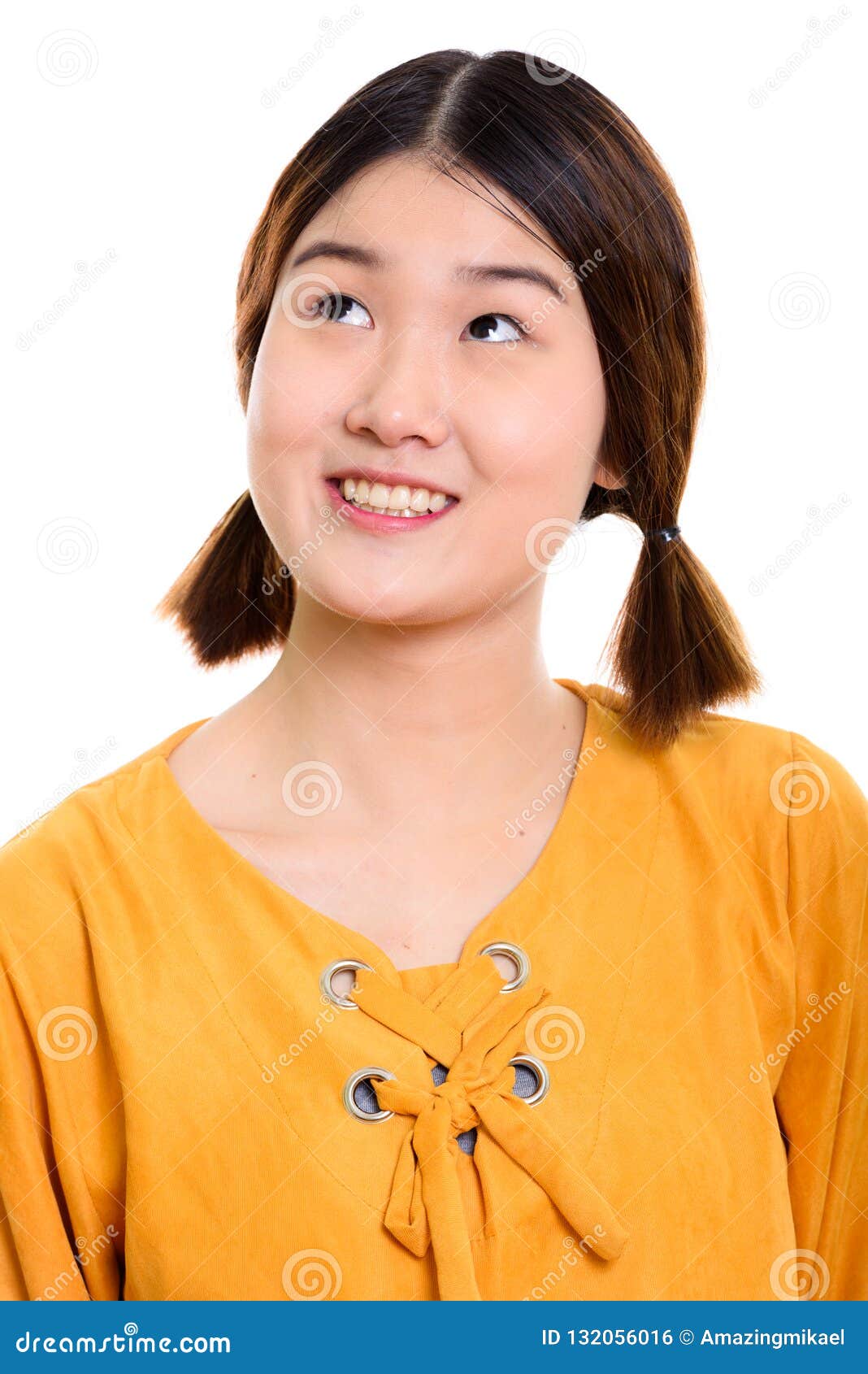 Face Of Young Happy Asian Woman Smiling While Thinking Stock Photo ...