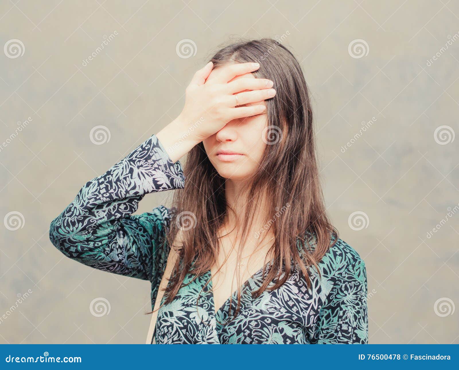 facepalm-girl-gray-wall-background-portrait-young-woman-doing-posing-against-76500478.jpg