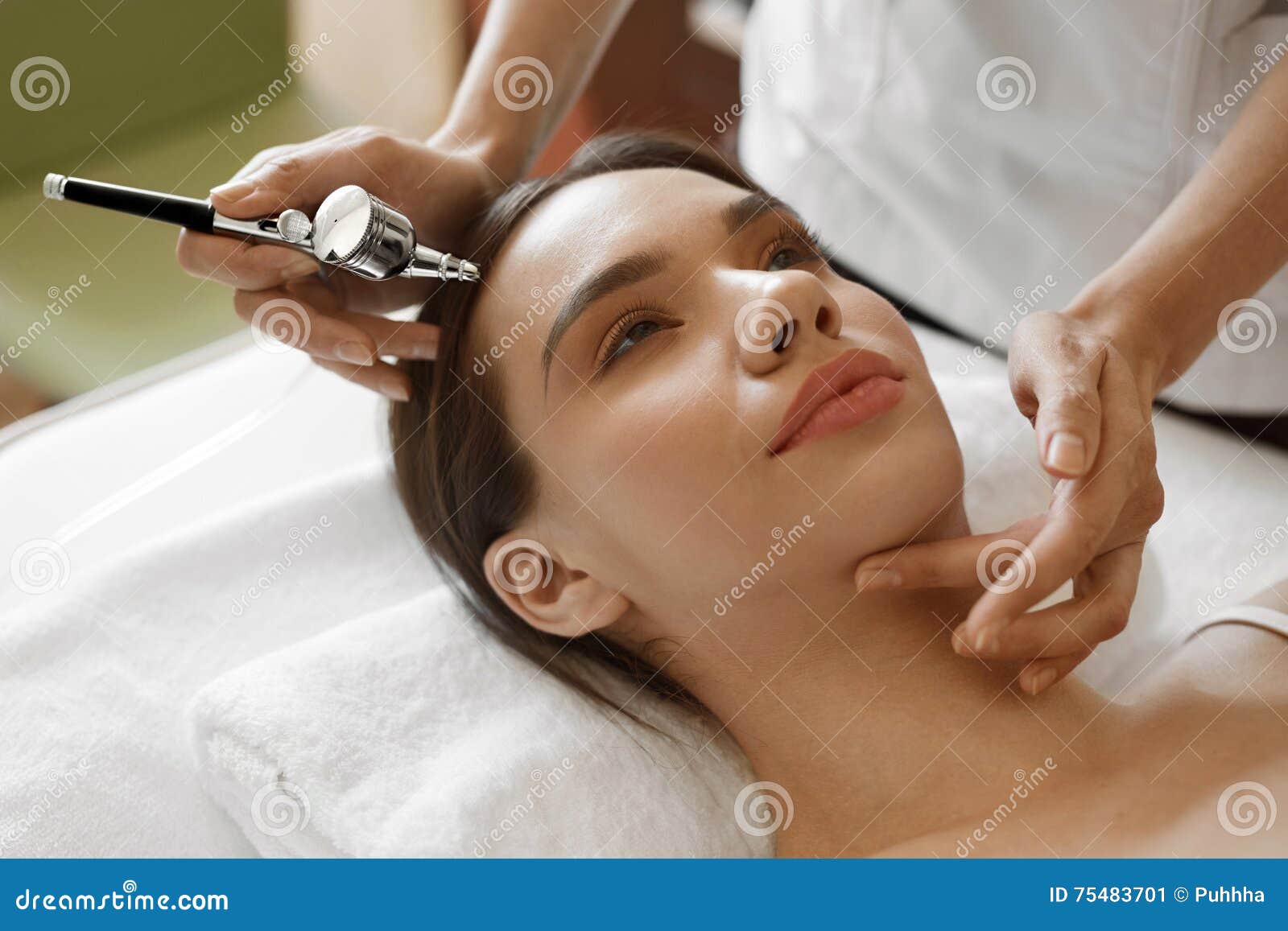 facial beauty treatment. woman getting oxygen skin peeling