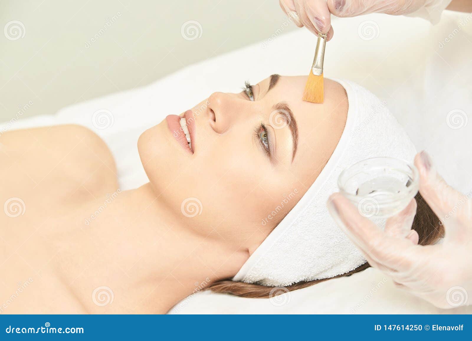 facial brush peel retinol treatment. beauty woman peeling procedure. cosmetology young girl therapy.hyaluronic acid