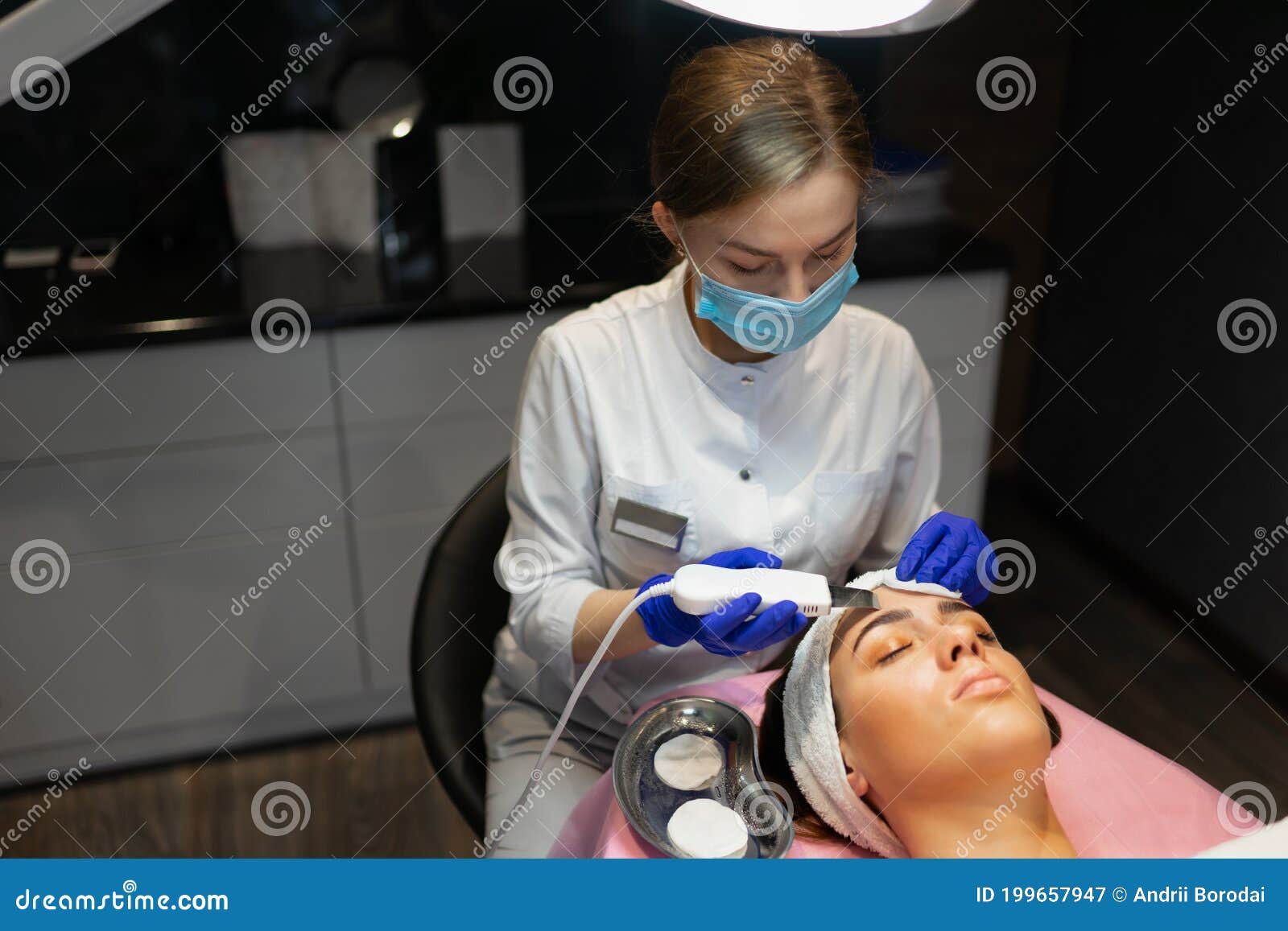 Facial Cleansing Procedure with Ultrasonic Scrubber. Stock Image