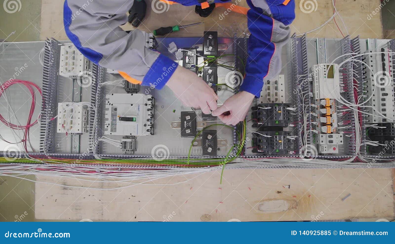 Factory Electrical Assembly Using a Hand Screwdriver in Factory