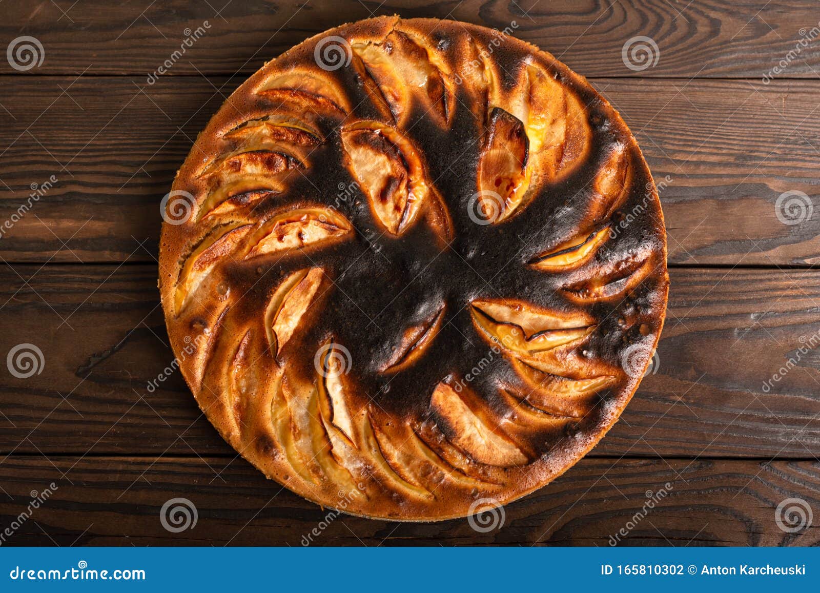 failed apple pie. burnt on top and the dough did not rise during baking. textured burnt pie crust.