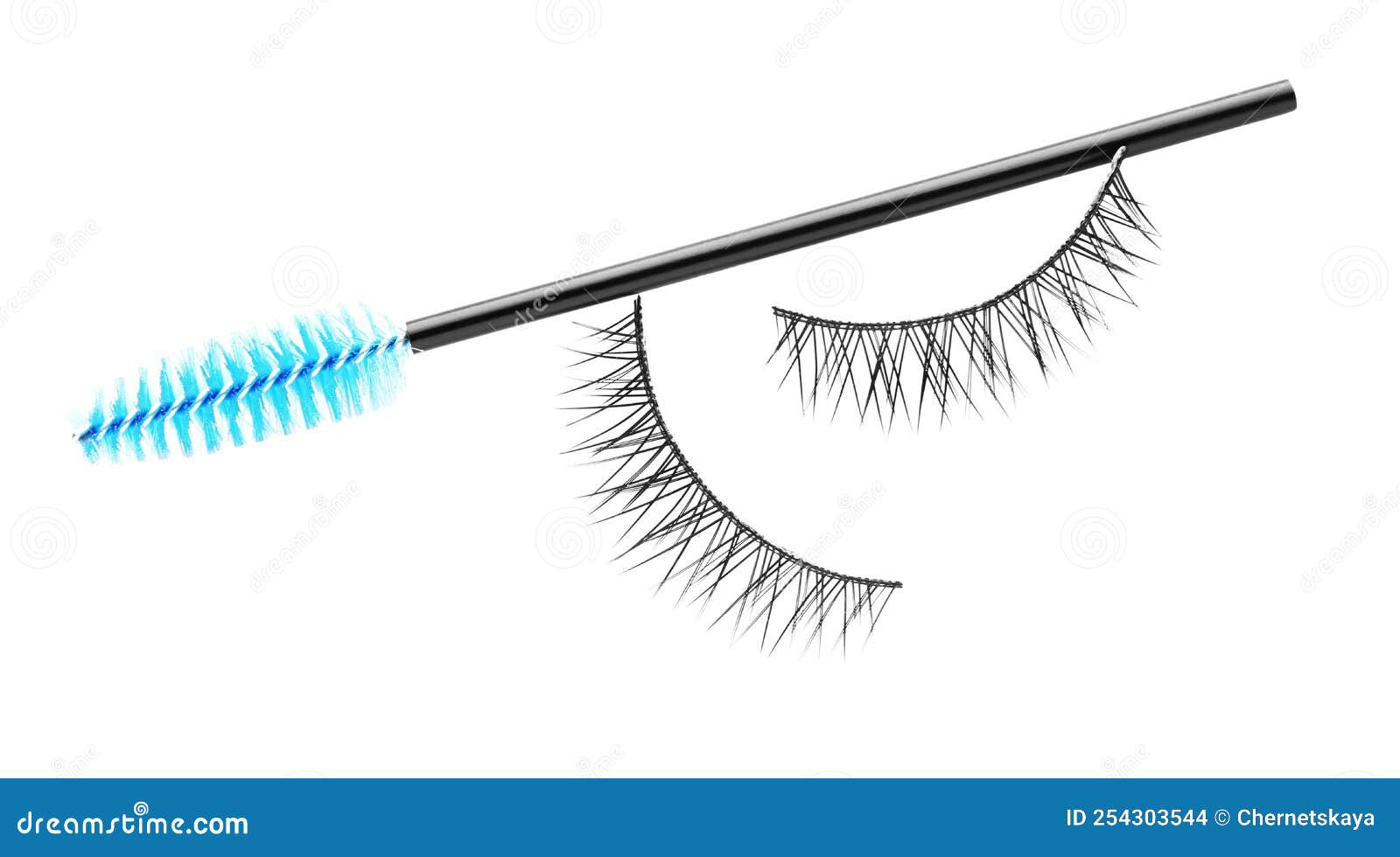 Fake Eyelashes and Brush on White Background, Top View Stock Photo
