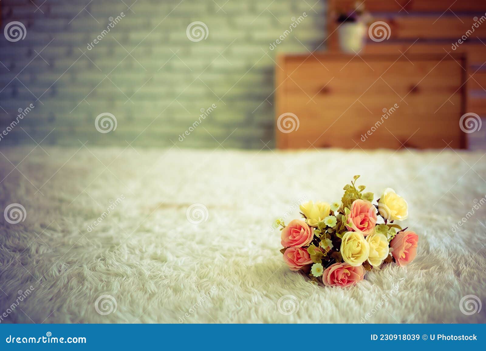 Fake flower on the bed stock image. Image of design 230918039