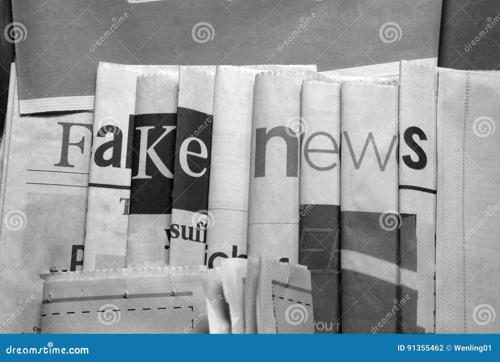 fake news on newspapers black and white background