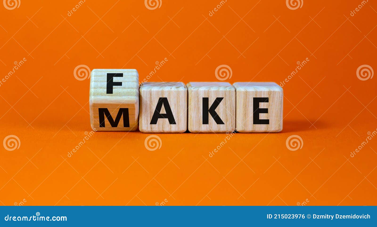 fake it until you make it . turned a cube and changed the word `fake` to `make`. beautiful orange background. business,