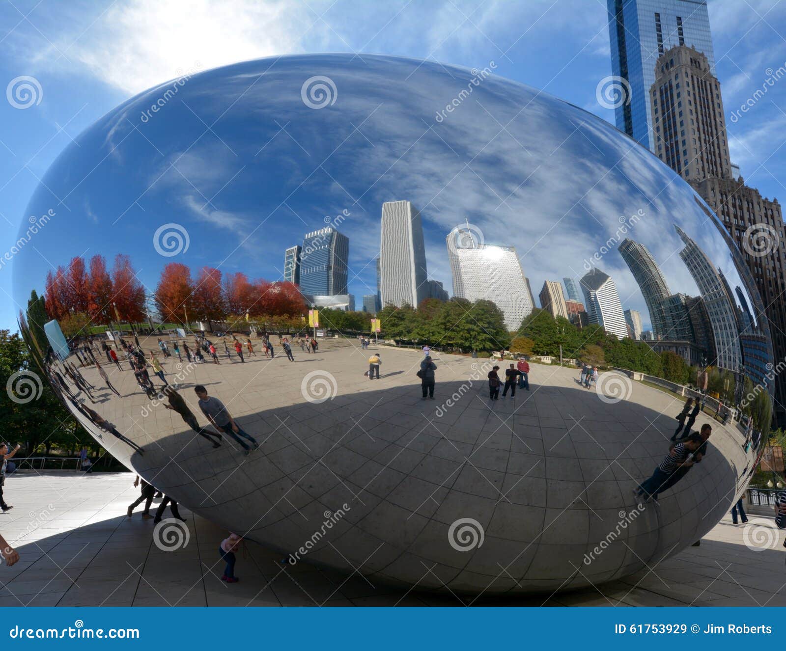 Fall Foilage On The Bean. This is a Fall picture of cirrus clouds and Fall foliage reflections on the iconic Bean in Millenium Park located in Chicago, Illinois. This picture was taken on November 2, 2015.