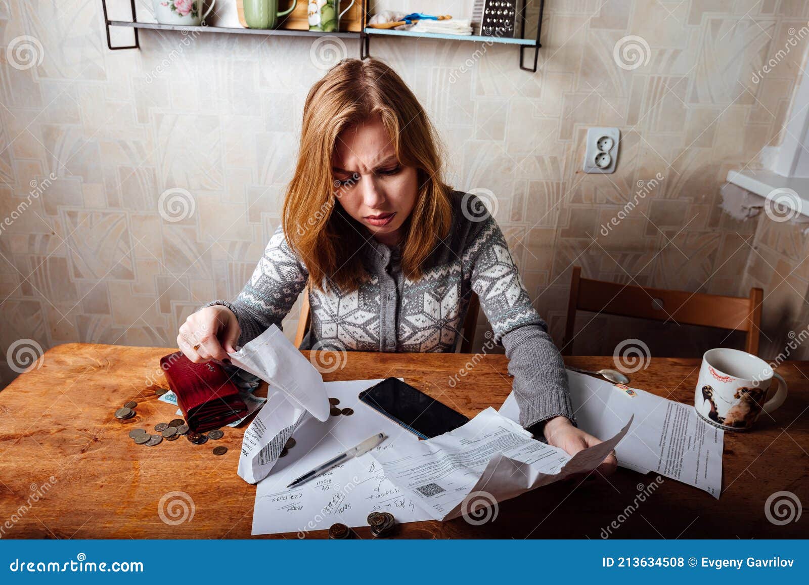 the-girl-calculates-taxes-and-fills-out-the-documents-on-the-bills