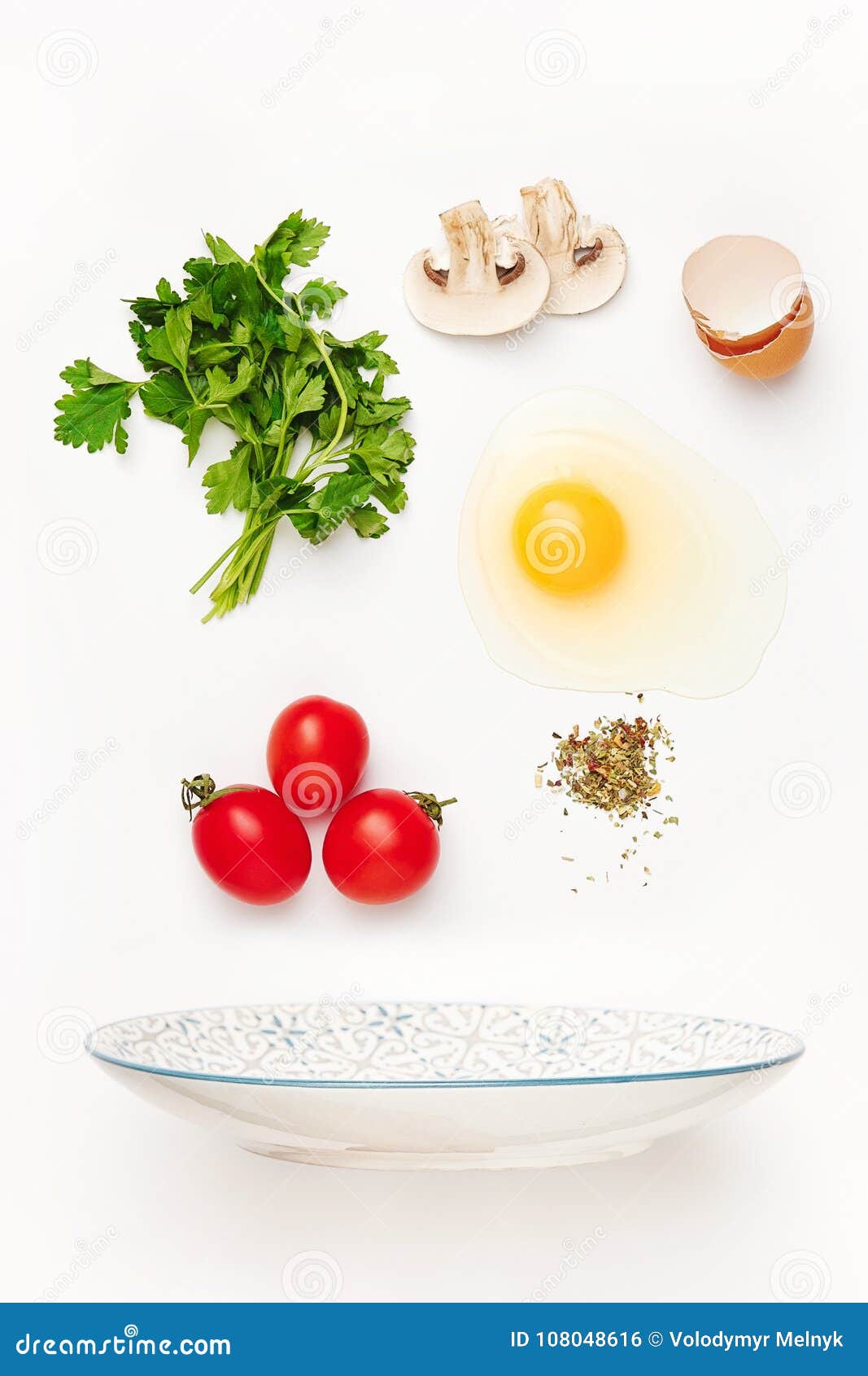 The Falling Ingredients of Fried Egg. Healthy Breakfast Ingredients