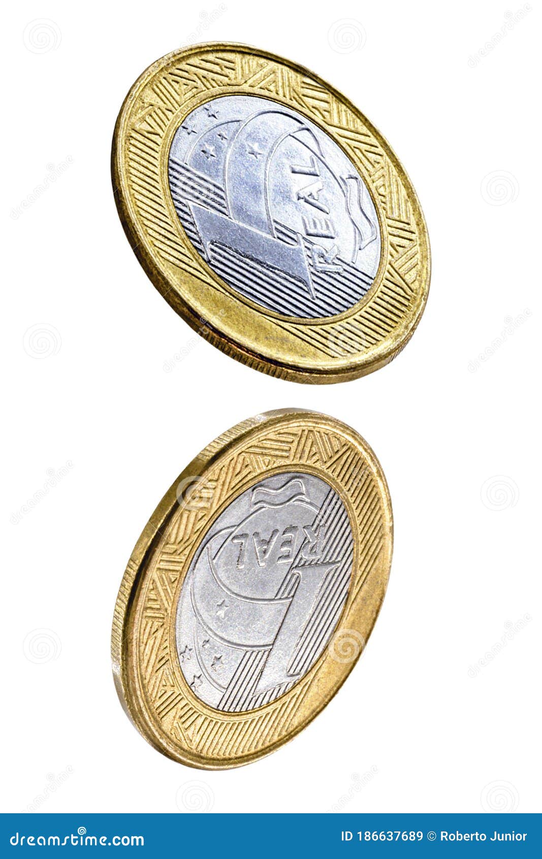 falling one brazilian real coins  on white background