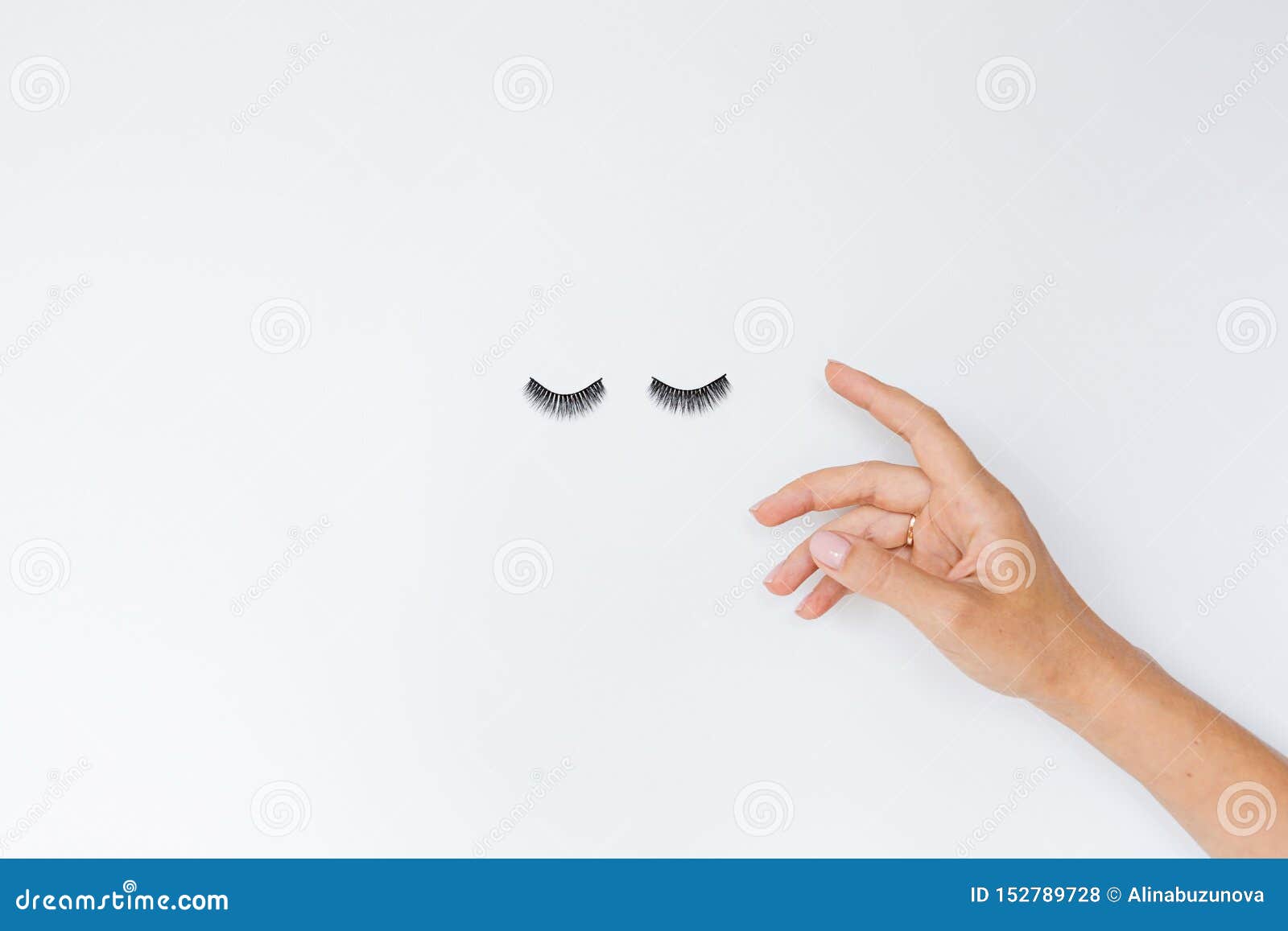 Download False Eyelashes And Female Hand Lying On White Background ...