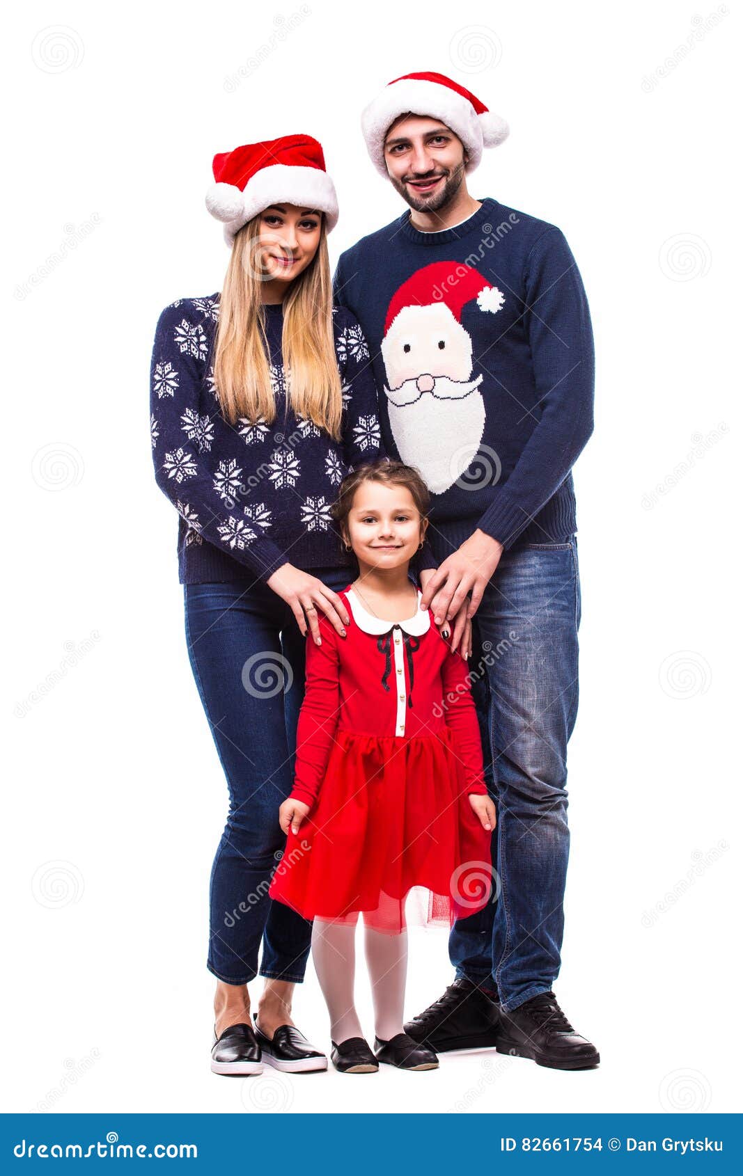 Família Nova Feliz Na Roupa Do Natal E No Chapéu De Santa Foto de Stock -  Imagem de clau, roupa: 82661754