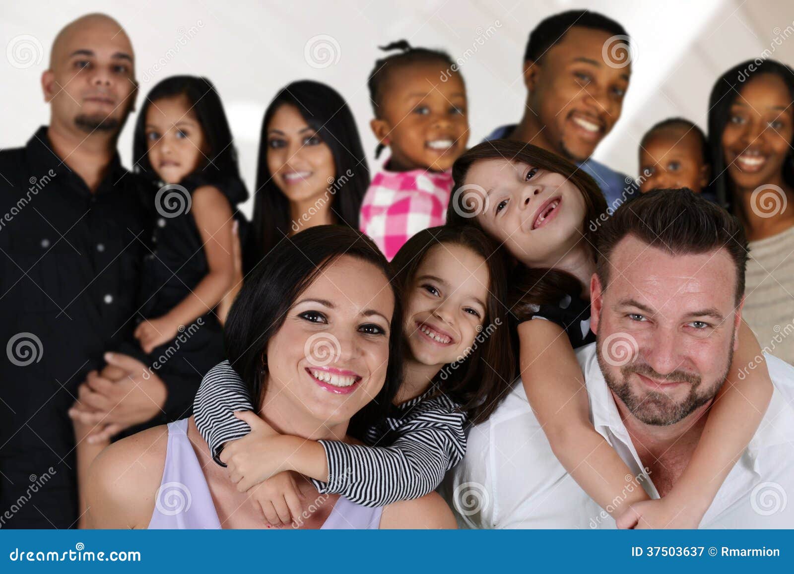 Group of different families together of all races. Group of different families together of all races.
